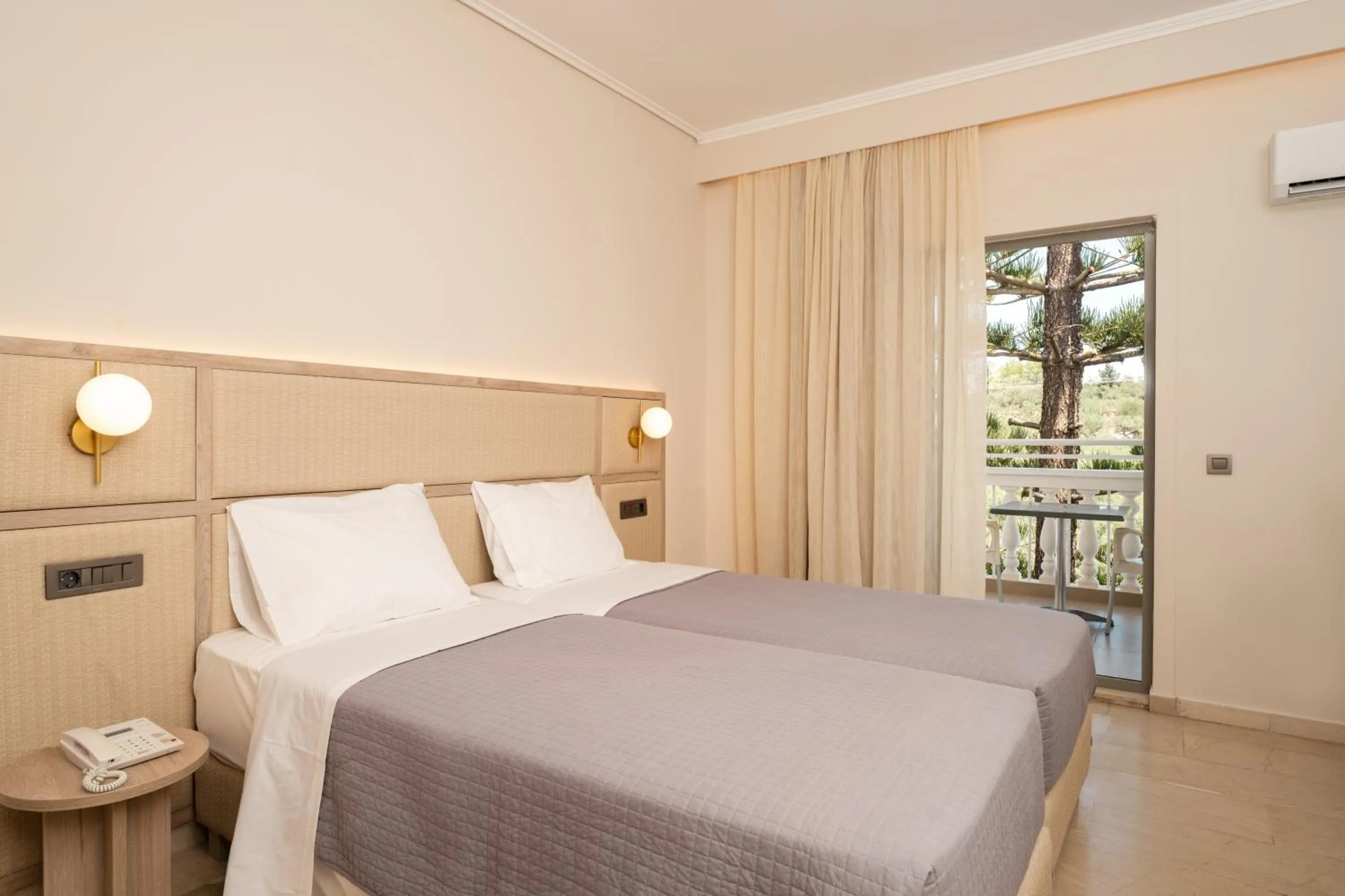 Bed in Karras Grande Resort