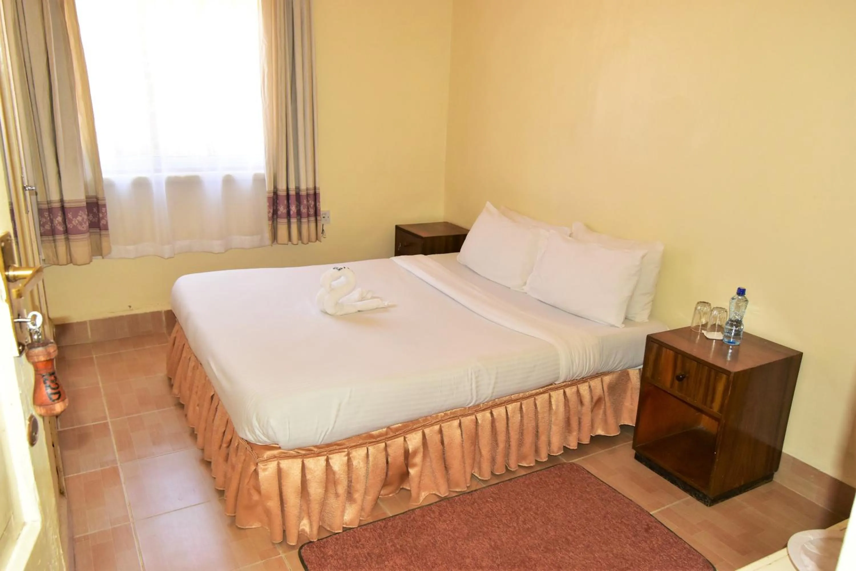 Guests, Bed in Wagon Wheel Hotel Eldoret