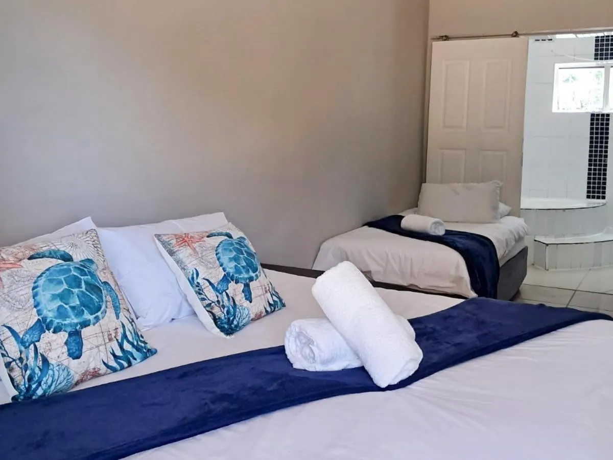 Photo of the whole room, Bed in SeaXplore Lodge & Dive Center