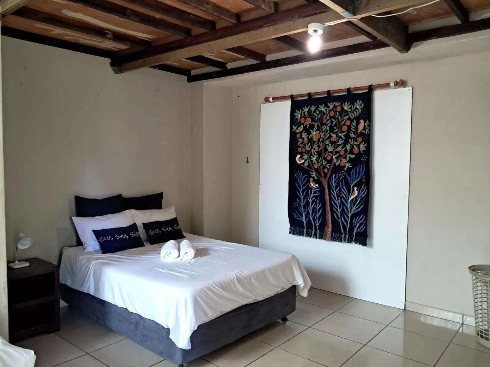 Bed in SeaXplore Lodge & Dive Center