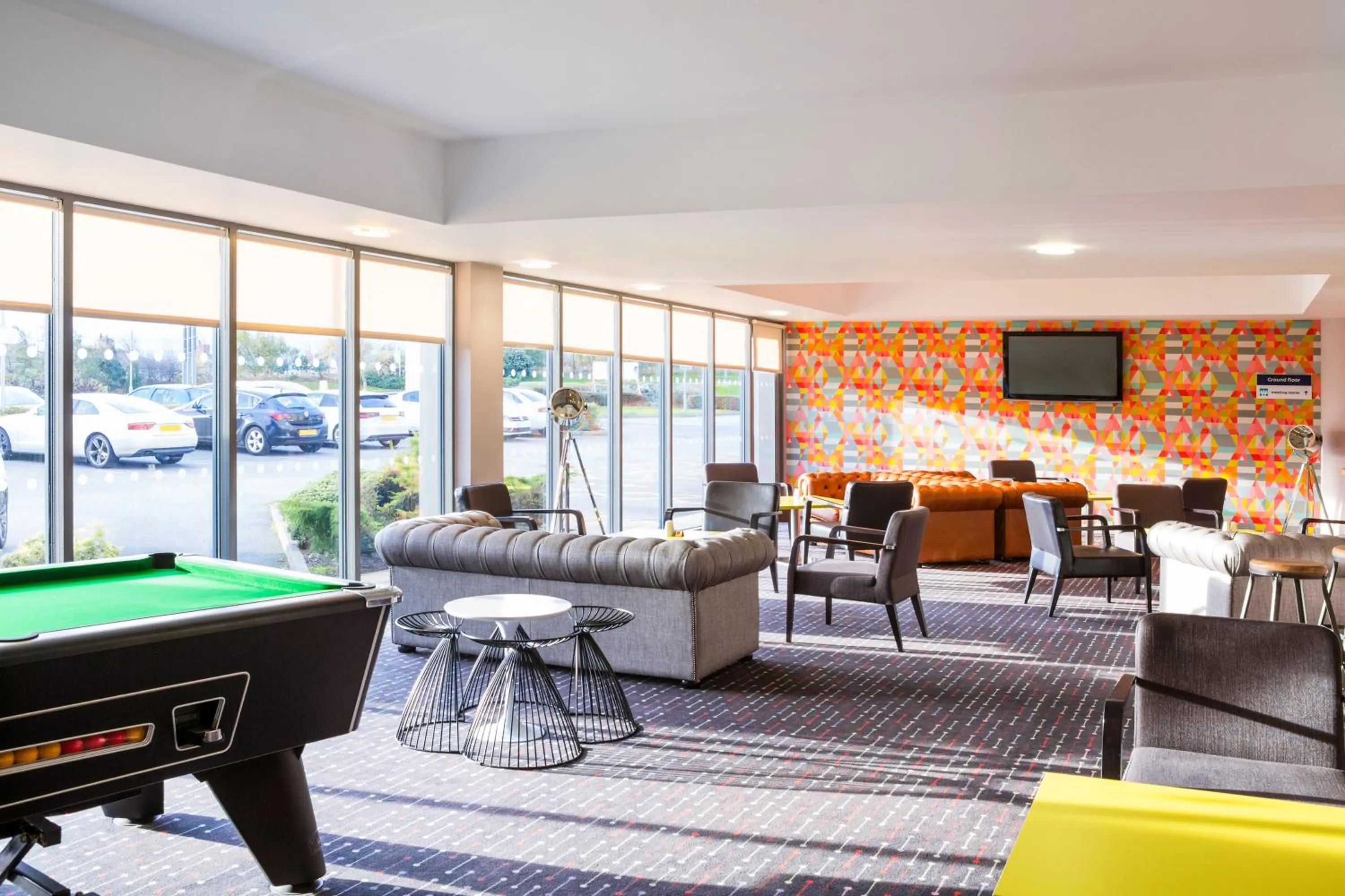Communal lounge/ TV room in ibis Styles Barnsley