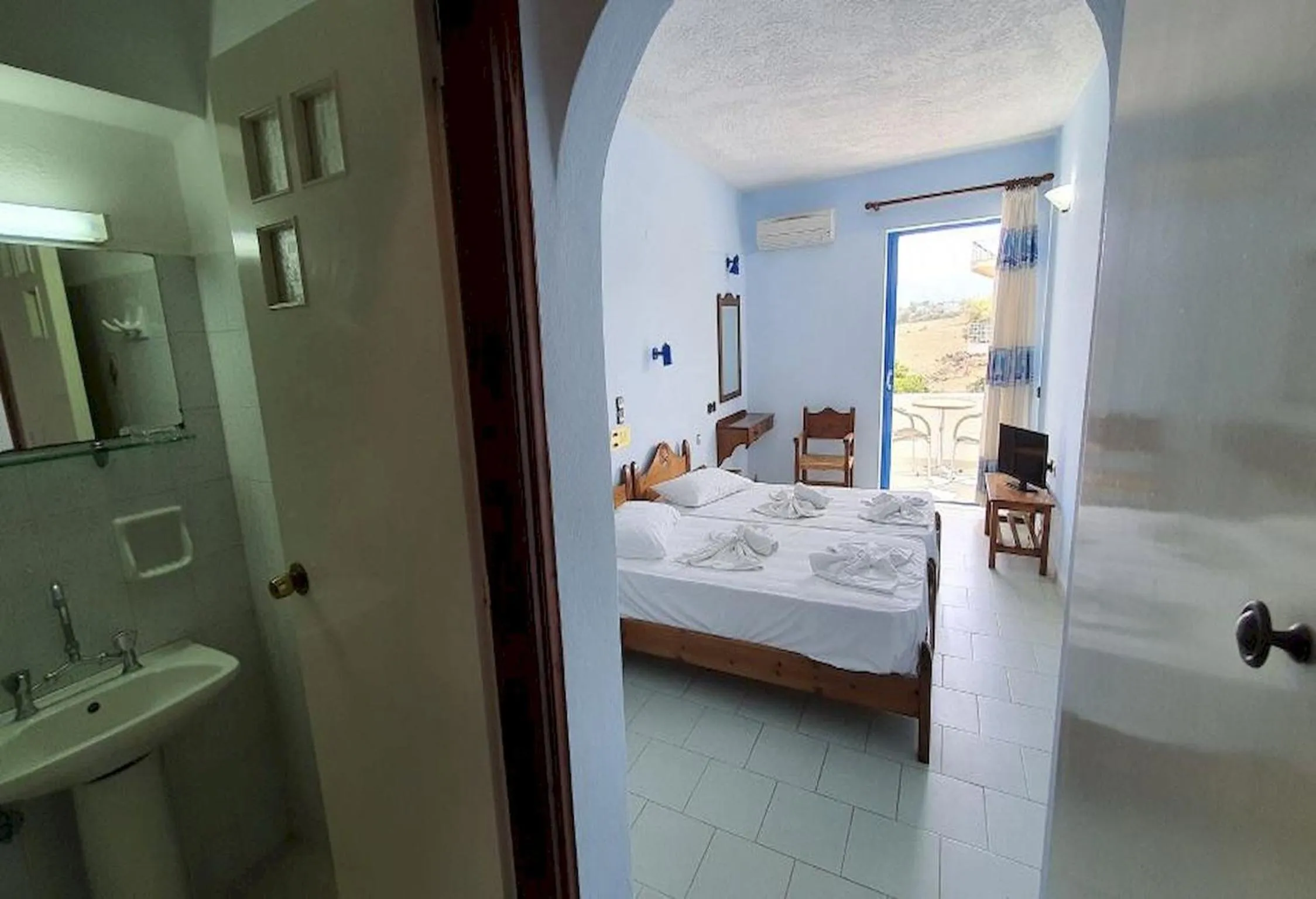 Bed in Stella Beach Hotel