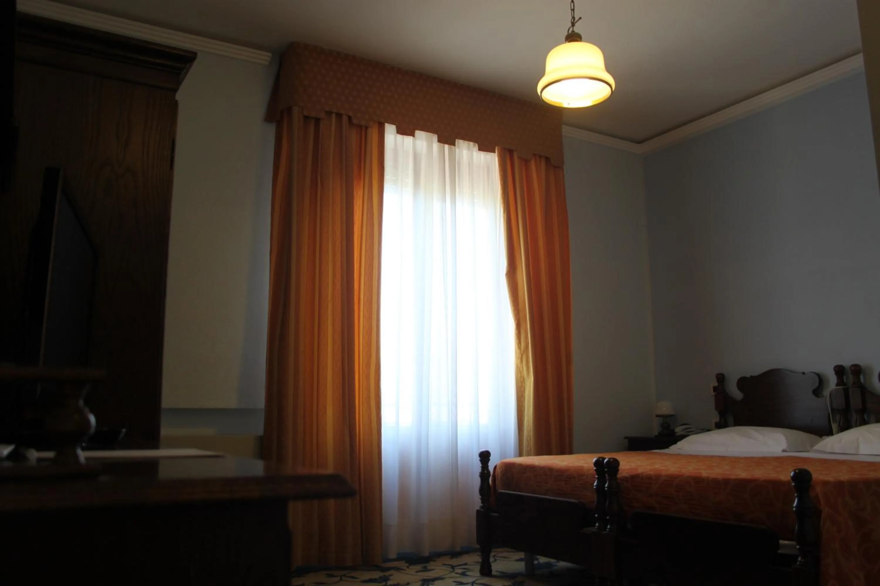 Living room, Bed in Hotel Girasole