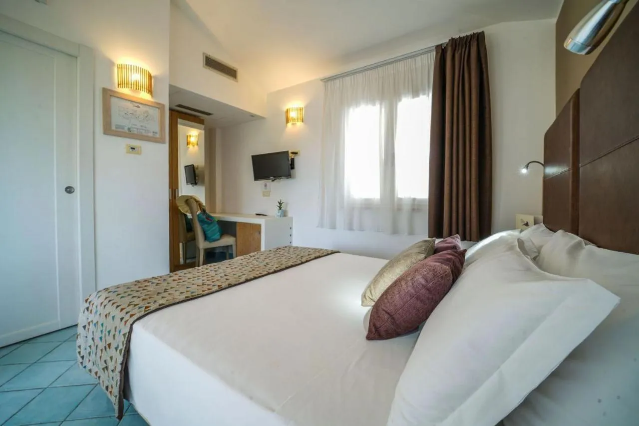 Bed in Baia del Godano Resort & Spa