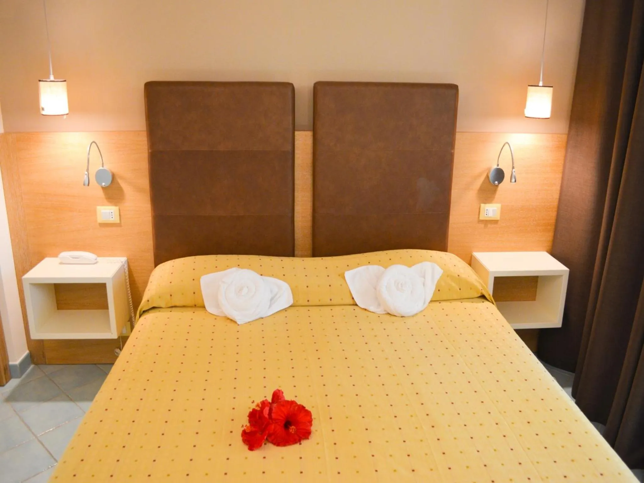 Bed in Baia del Godano Resort & Spa