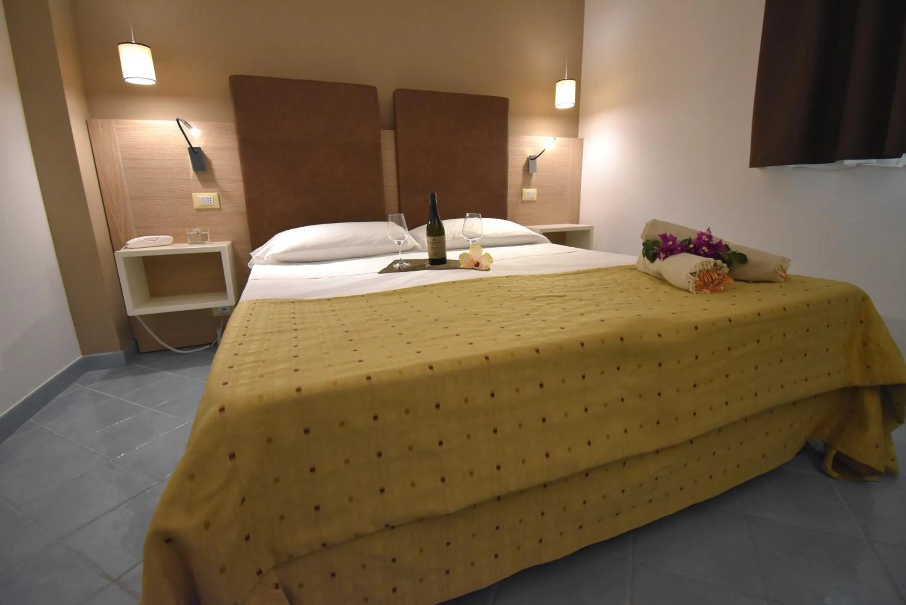 Bedroom, Bed in Baia del Godano Resort & Spa