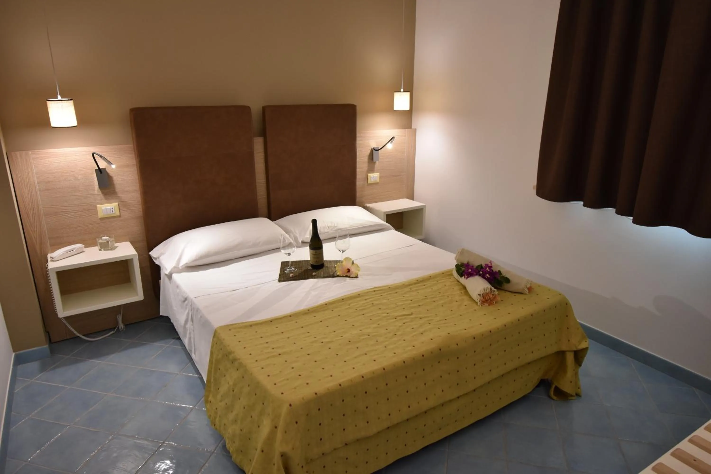 Bedroom, Bed in Baia del Godano Resort & Spa