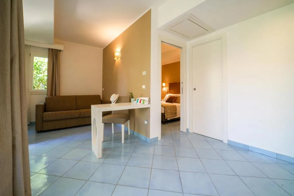 Bed in Baia del Godano Resort & Spa