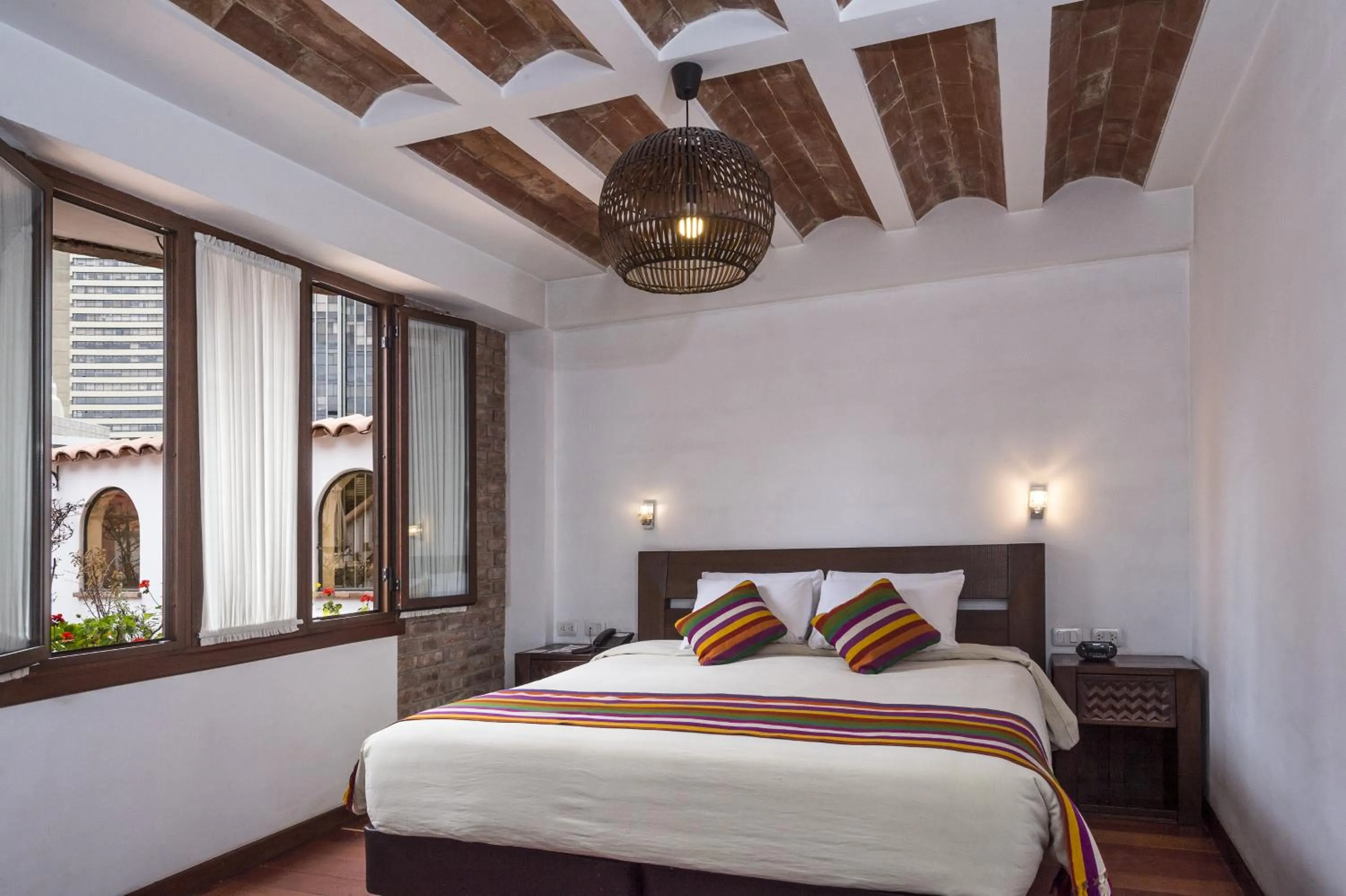 Bed in La Casona Hotel Boutique