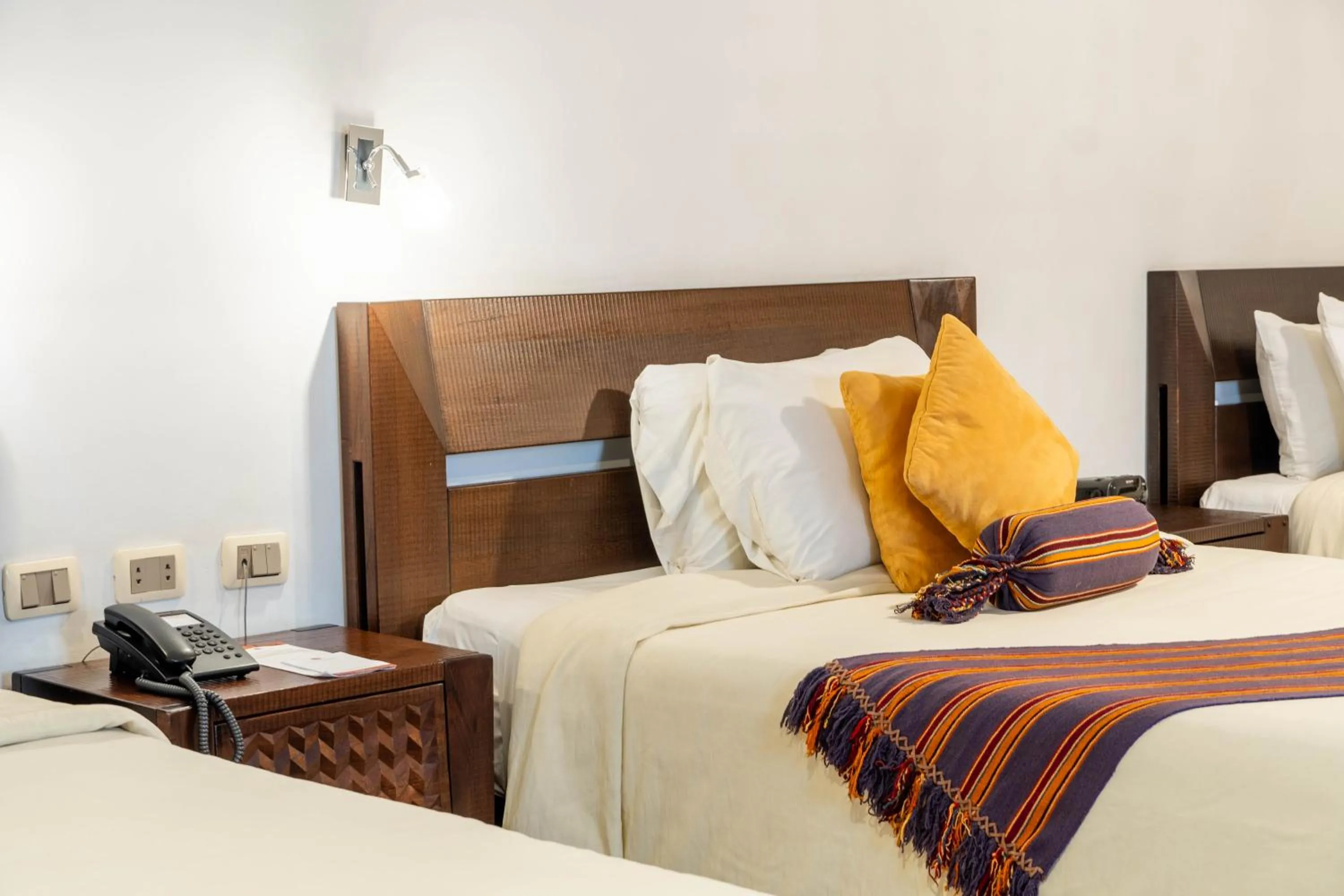 Bed in La Casona Hotel Boutique