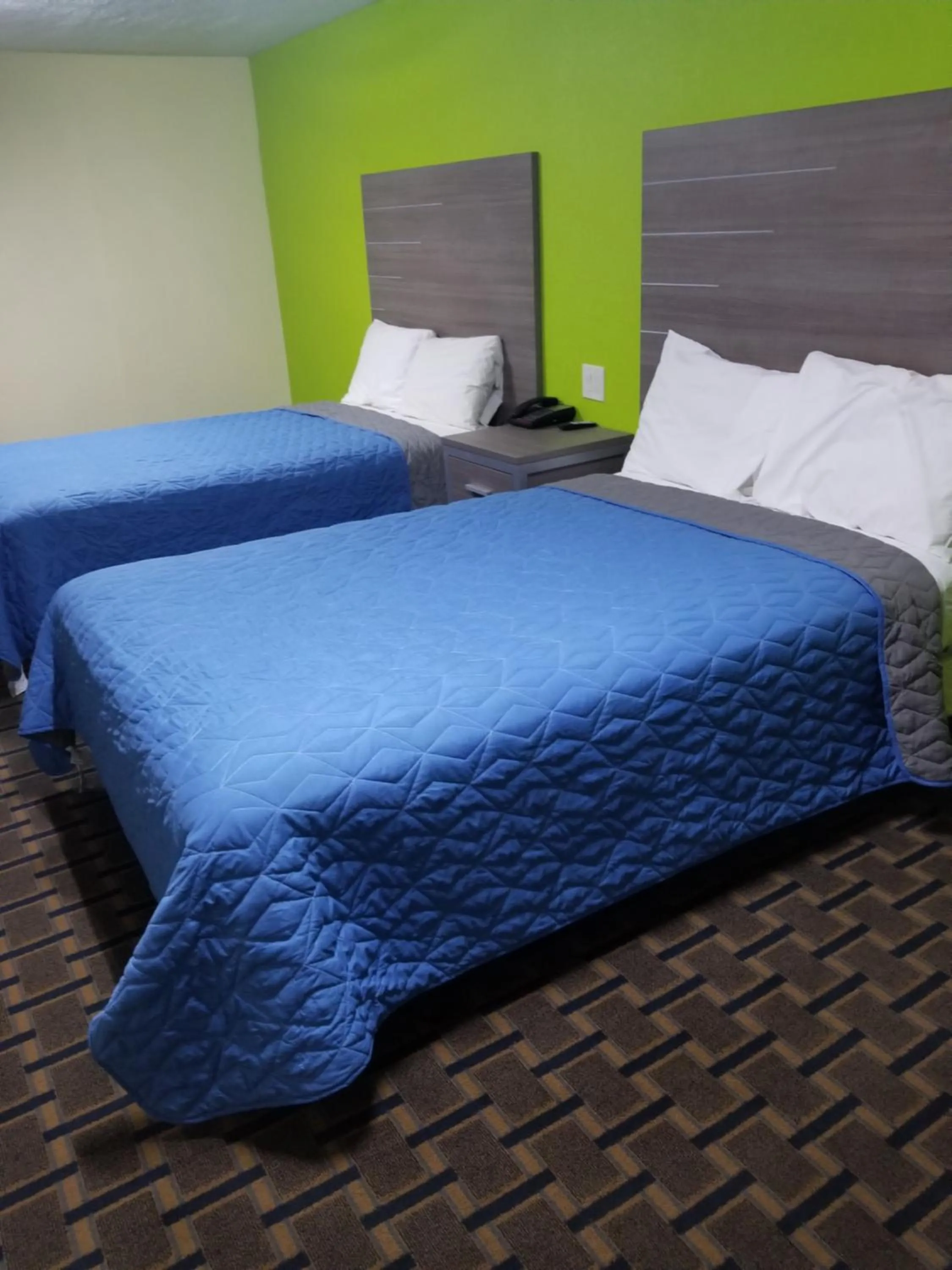 Bed in Economy Inn Motel