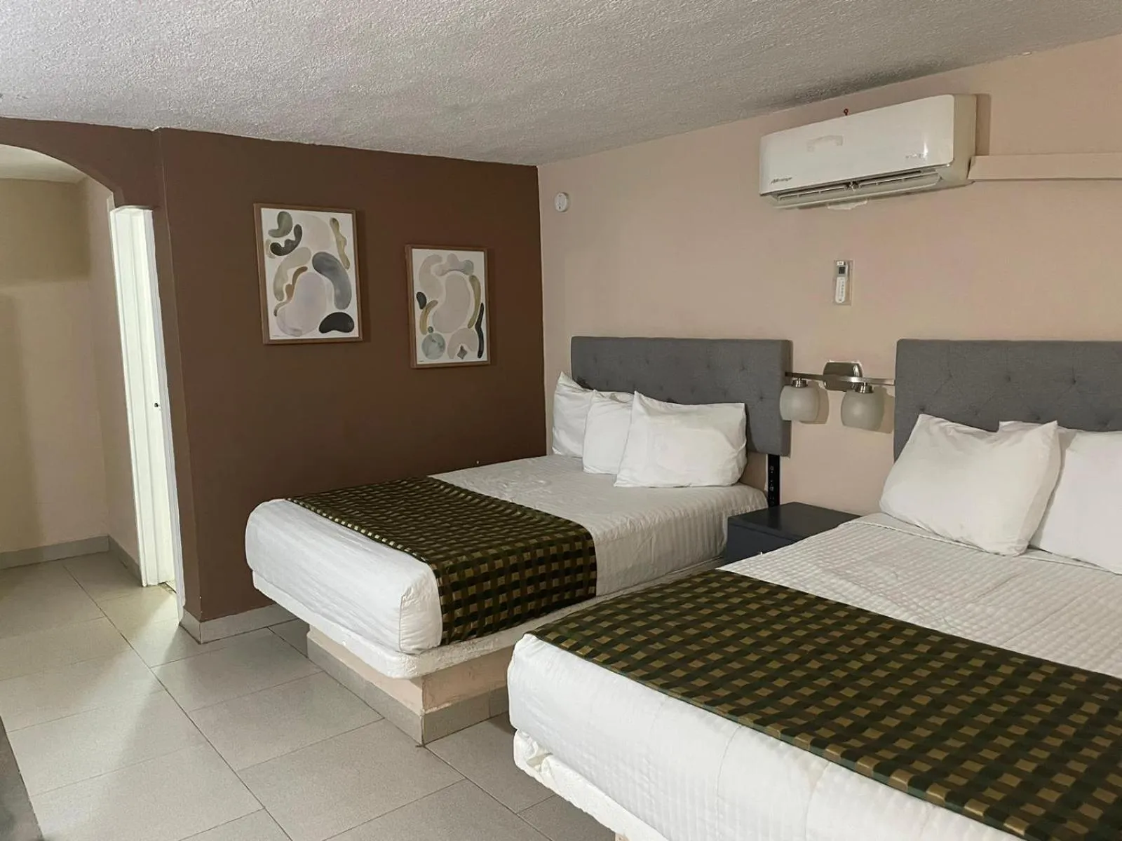 Bed in Hotel Flamingo