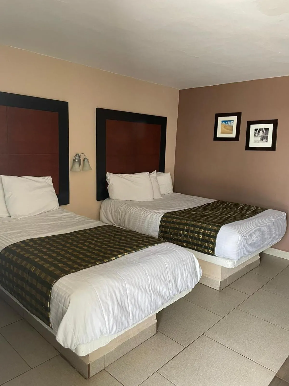 Bed in Hotel Flamingo