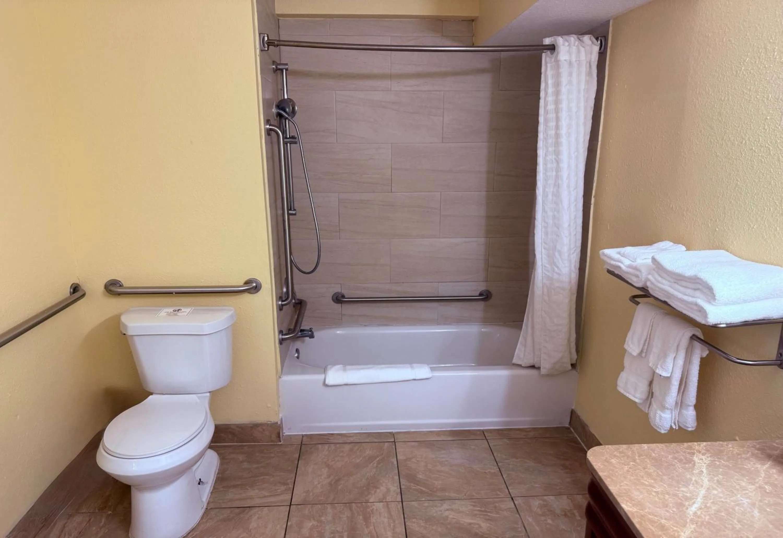 Bathroom in Days Inn by Wyndham St. Petersburg / Tampa Bay Area