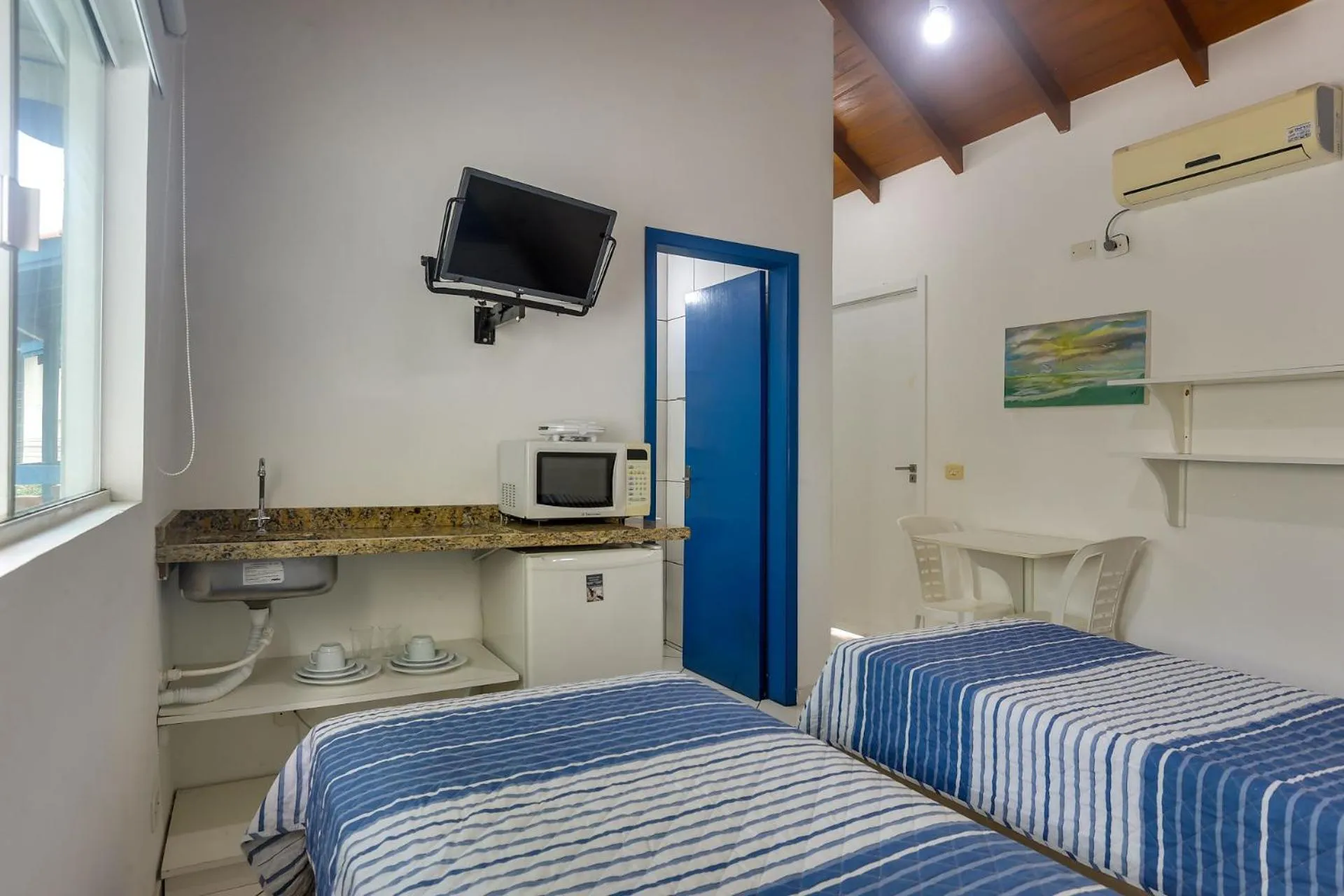 Bed in Pousada Canario Azul