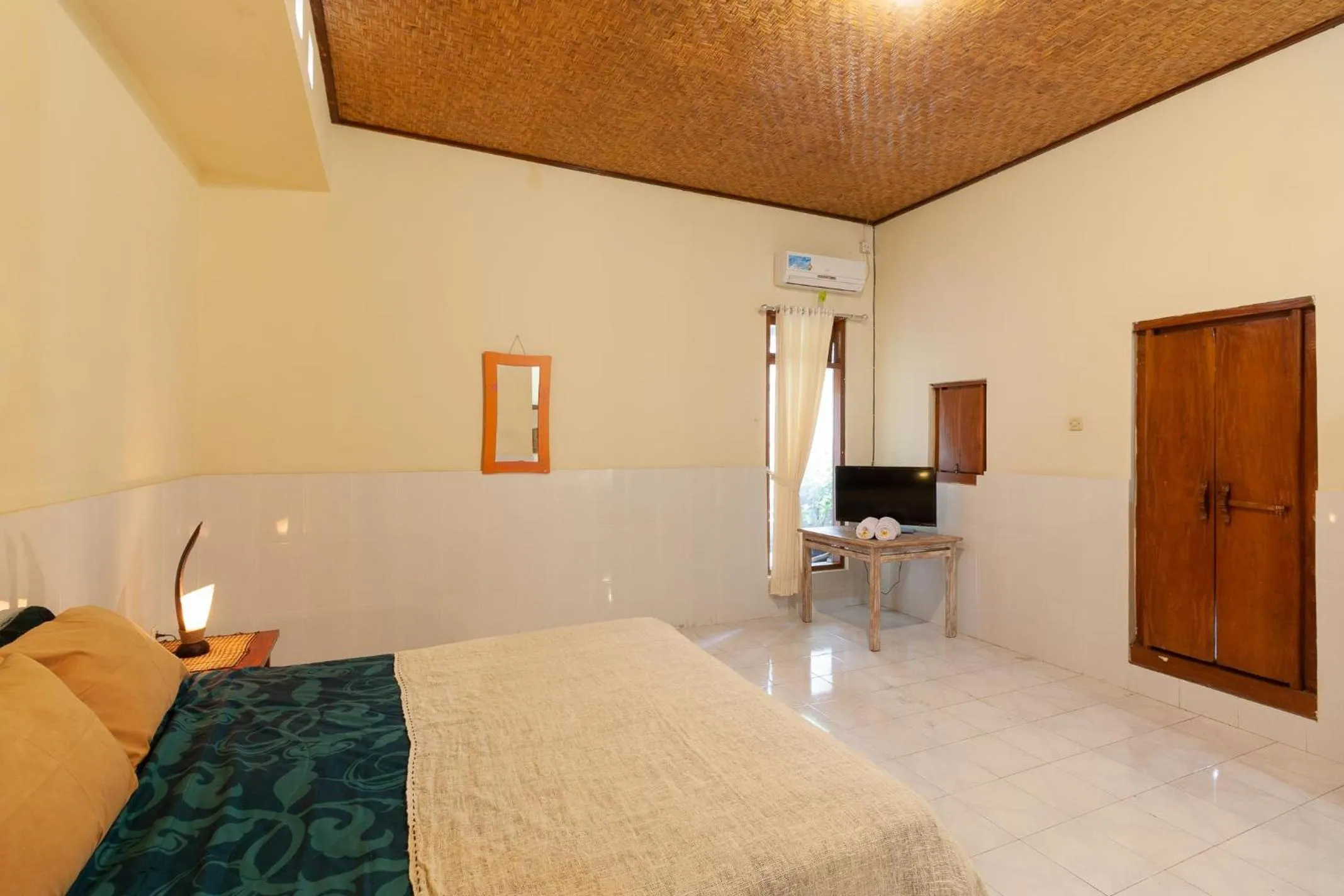 Bedroom in The Guest Villas Legian Kuta