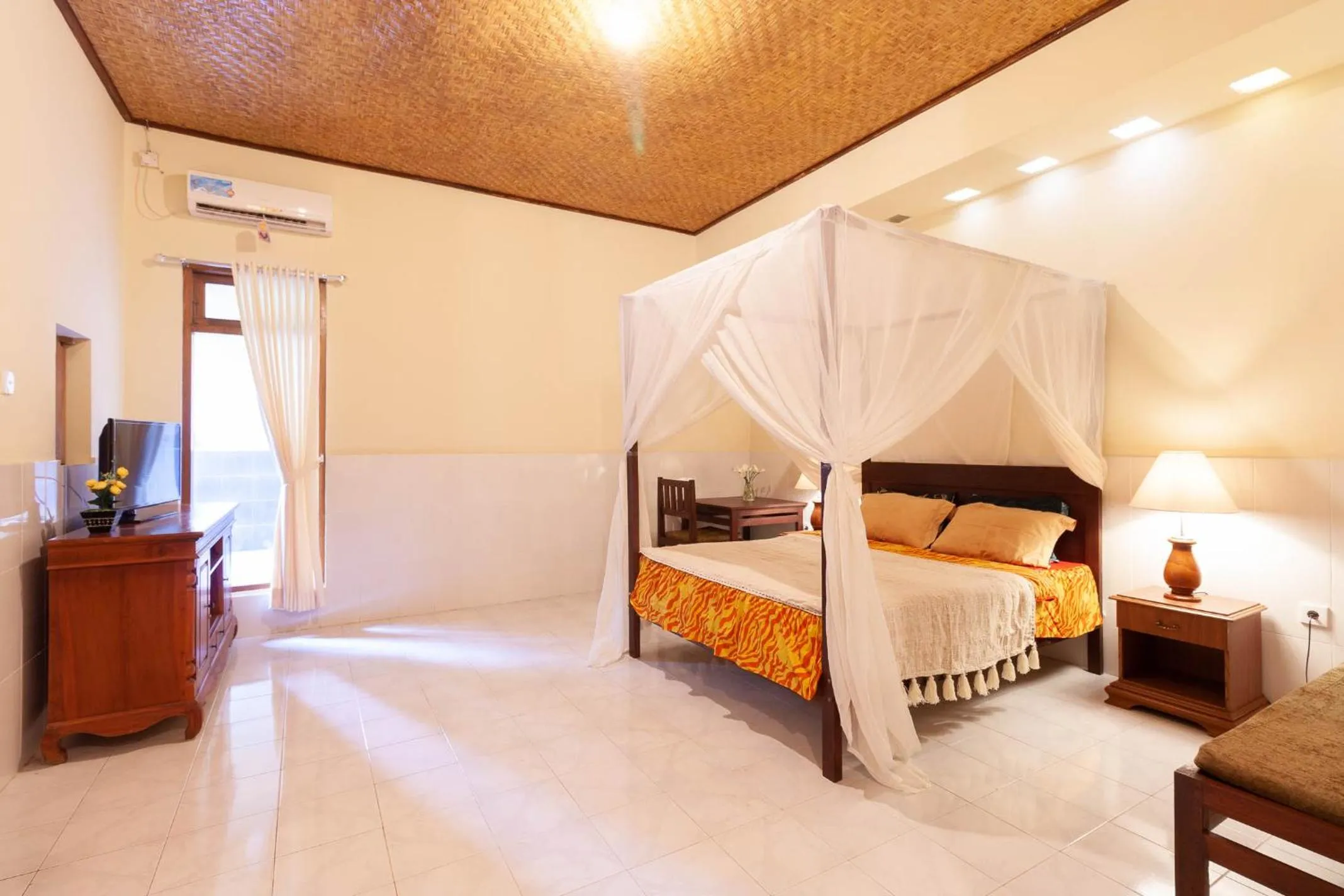 Bedroom in The Guest Villas Legian Kuta