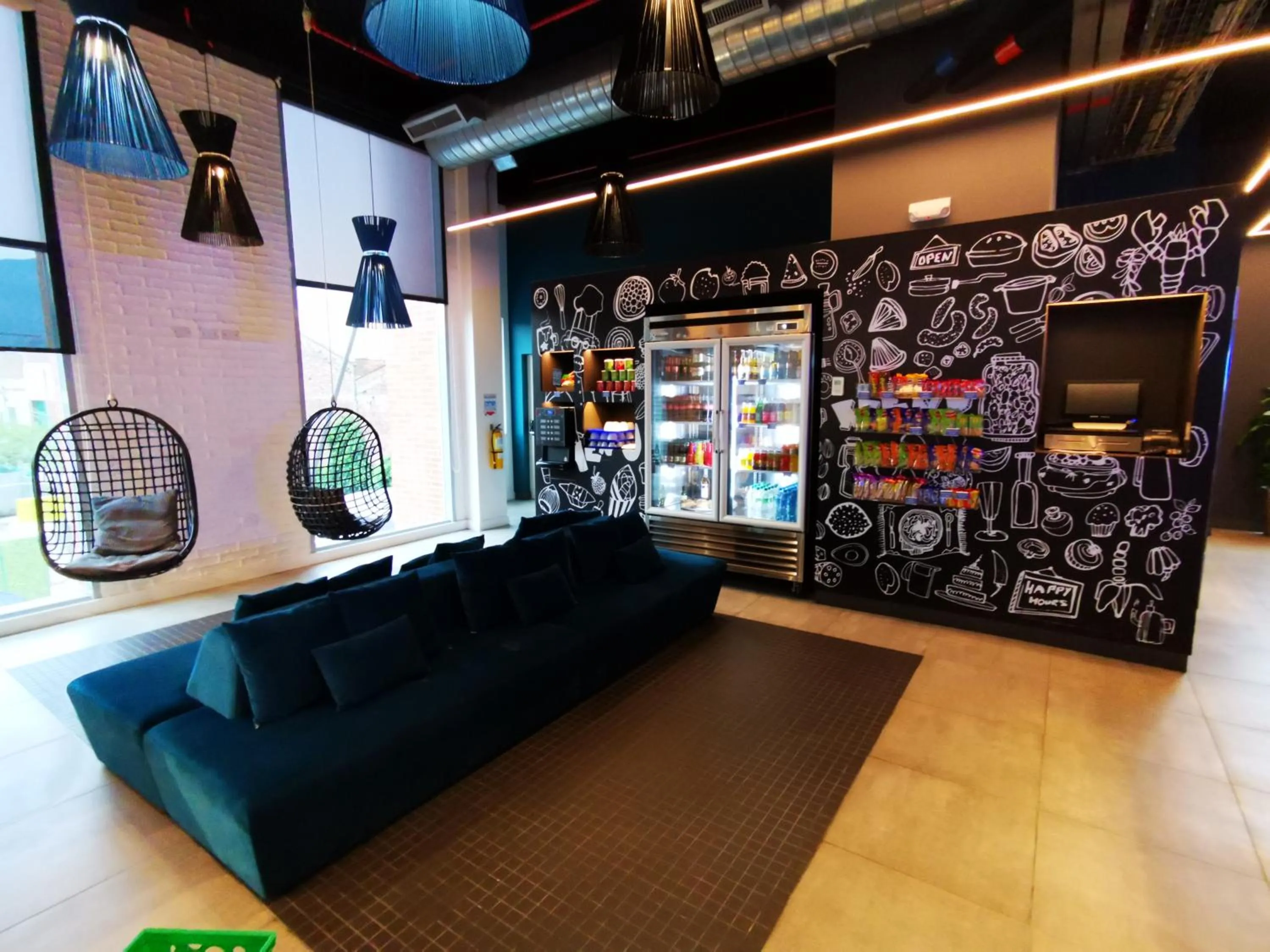 Living room in ibis budget Medellín Itagüí Metro