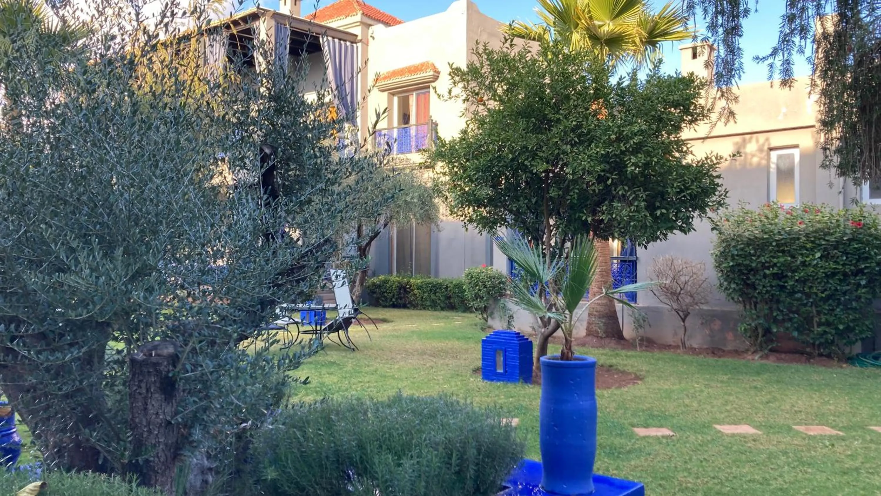 Garden view in Villas 95 Appart'Hôtel