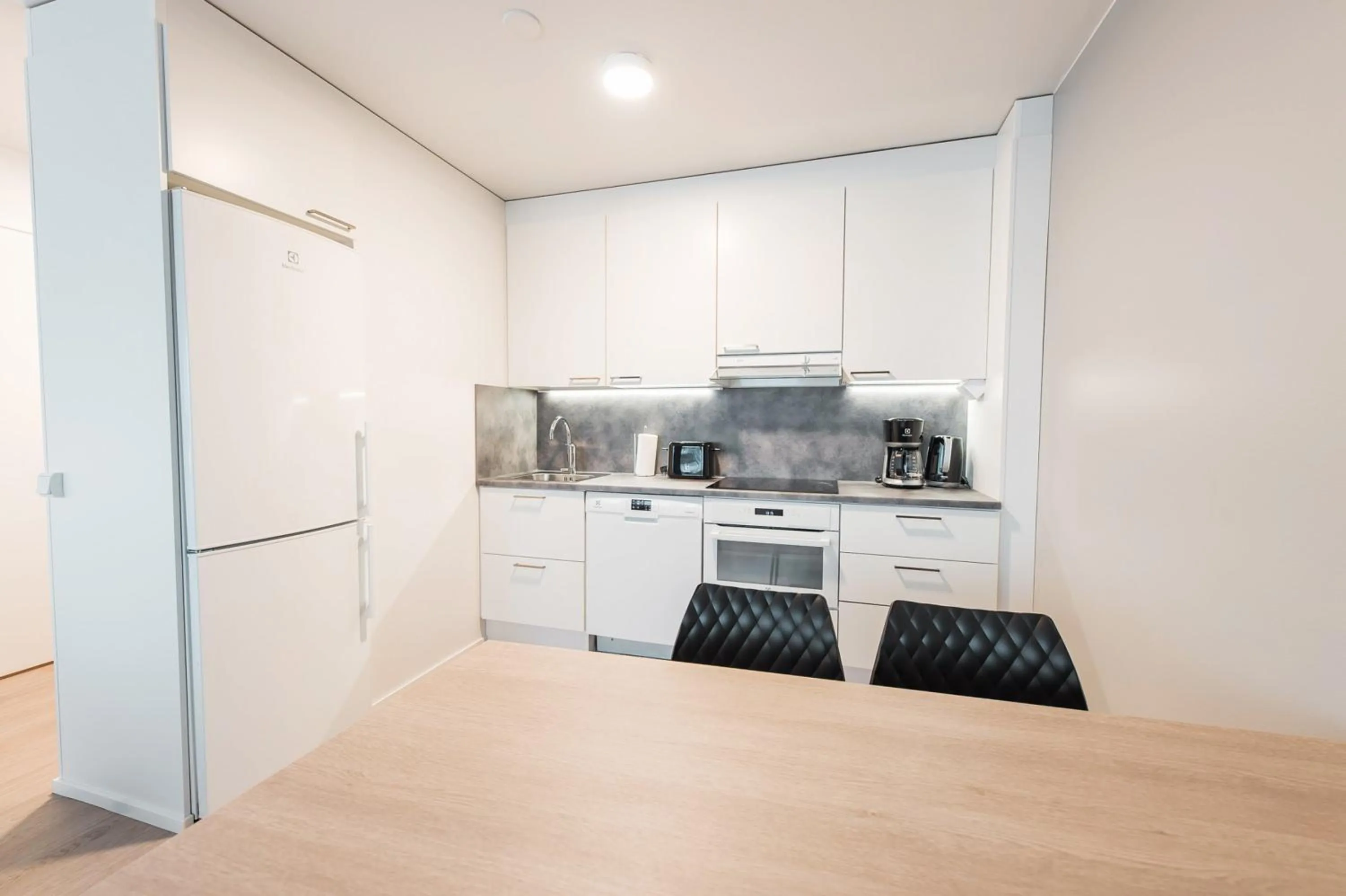 kitchen in Forenom Aparthotel Helsinki Pikku Huopalahti