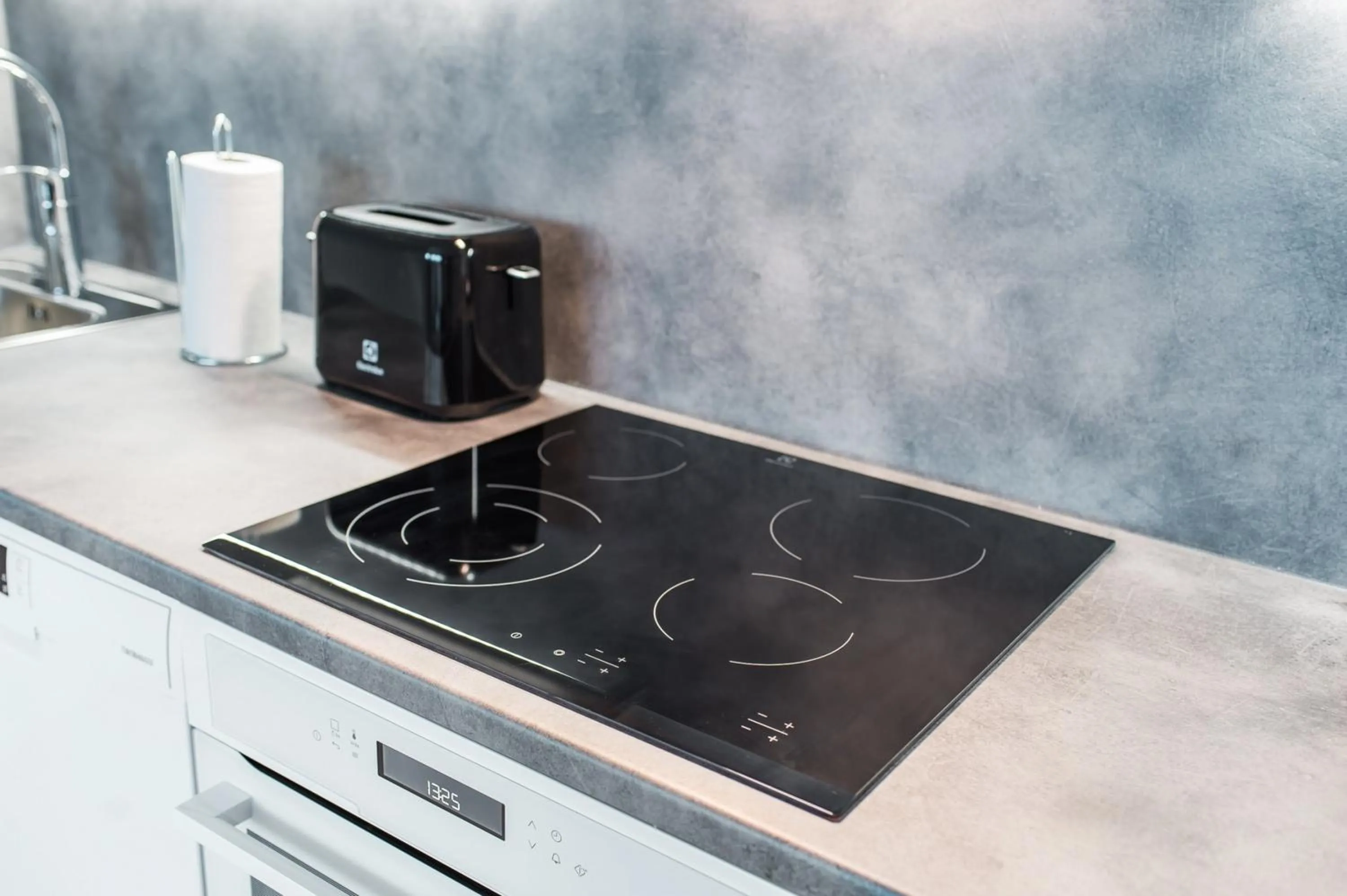 kitchen in Forenom Aparthotel Helsinki Pikku Huopalahti