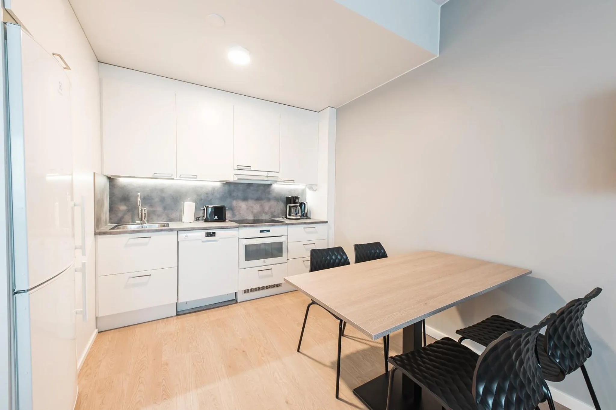 Kitchen or kitchenette in Forenom Aparthotel Helsinki Pikku Huopalahti