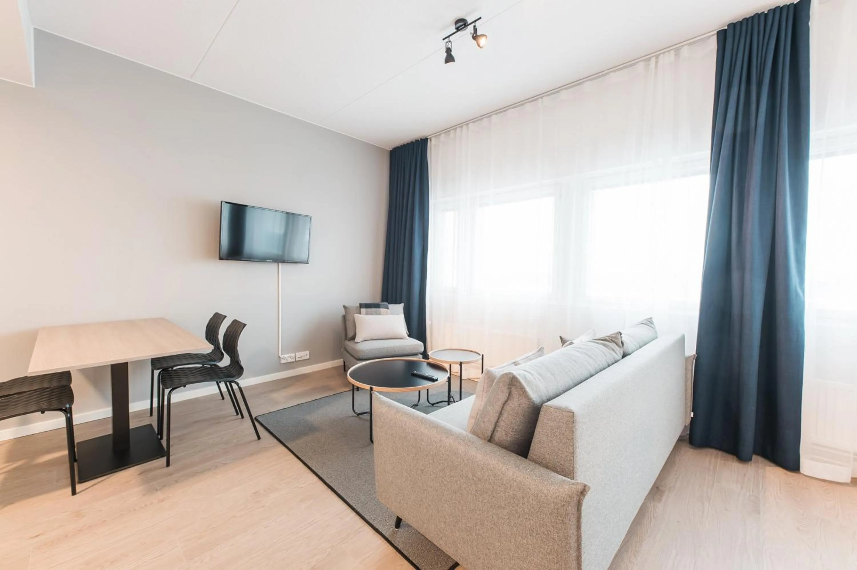 Living room in Forenom Aparthotel Helsinki Pikku Huopalahti