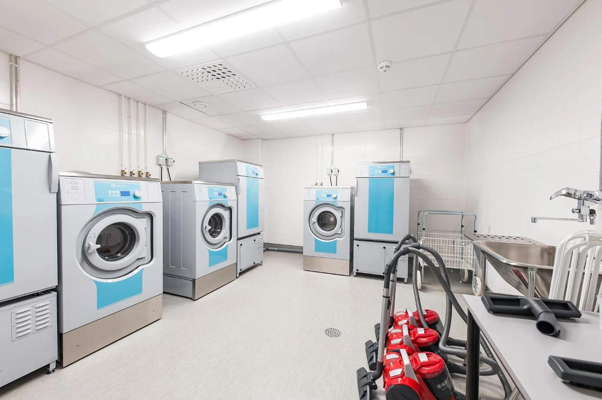 washing machine in Forenom Aparthotel Helsinki Pikku Huopalahti