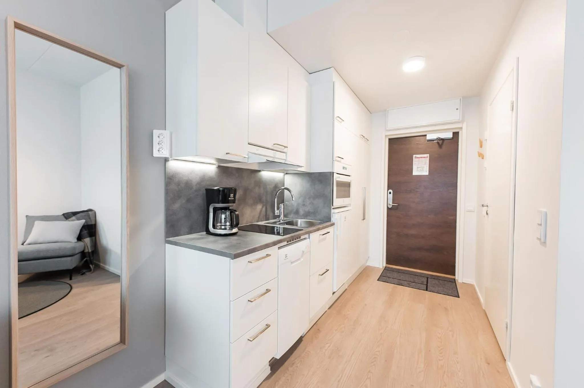 Kitchen or kitchenette in Forenom Aparthotel Helsinki Pikku Huopalahti