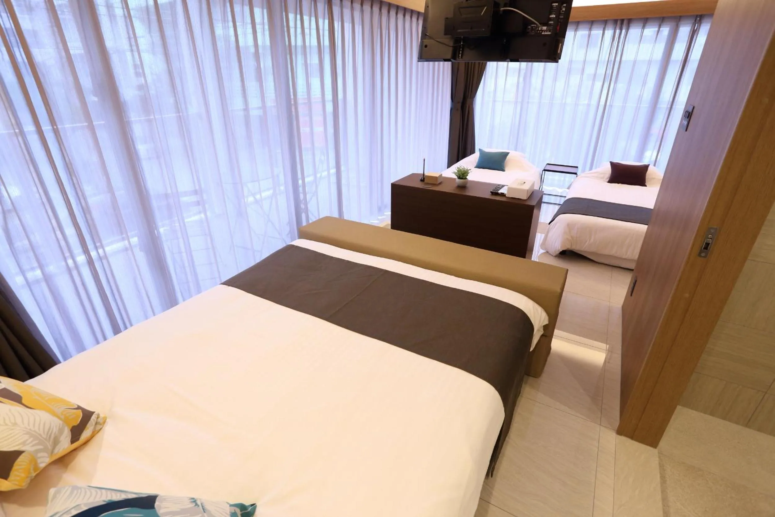 Photo of the whole room, Bed in Tabinoteitaku Okinawa Naha