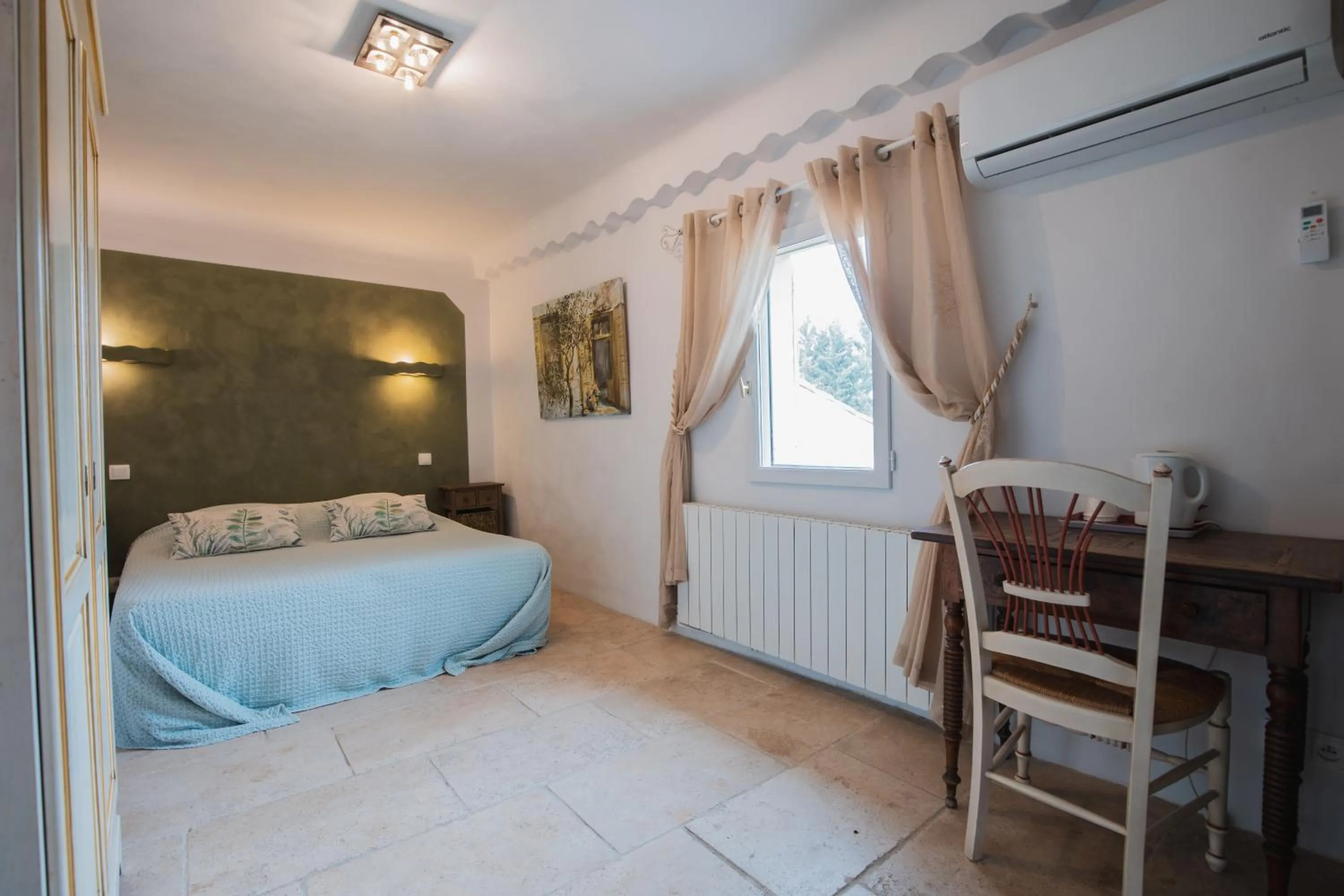 Bedroom, Bed in Chambres & Tables d'hôtes Moulin de Lavon