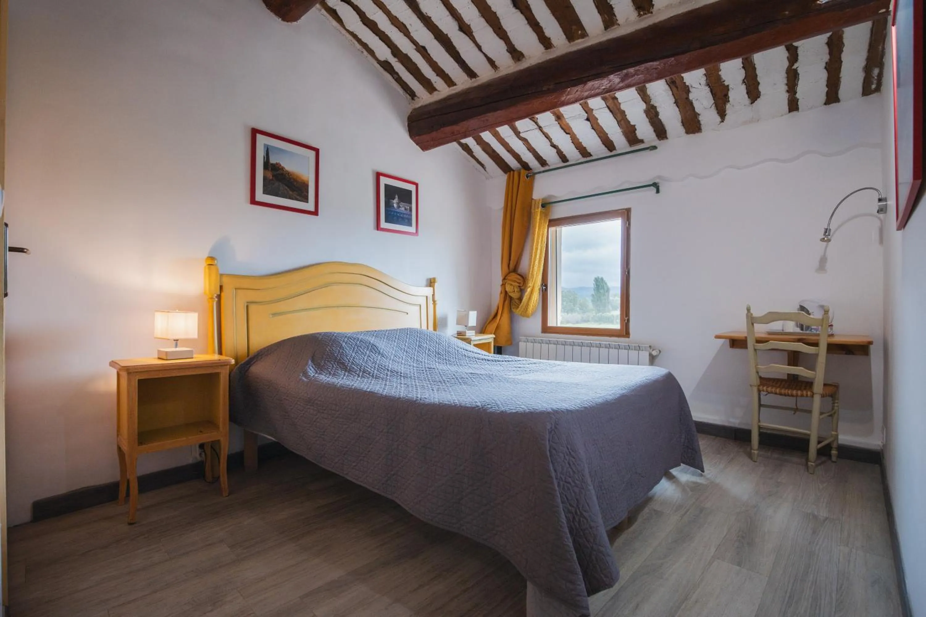 Bedroom, Bed in Chambres & Tables d'hôtes Moulin de Lavon