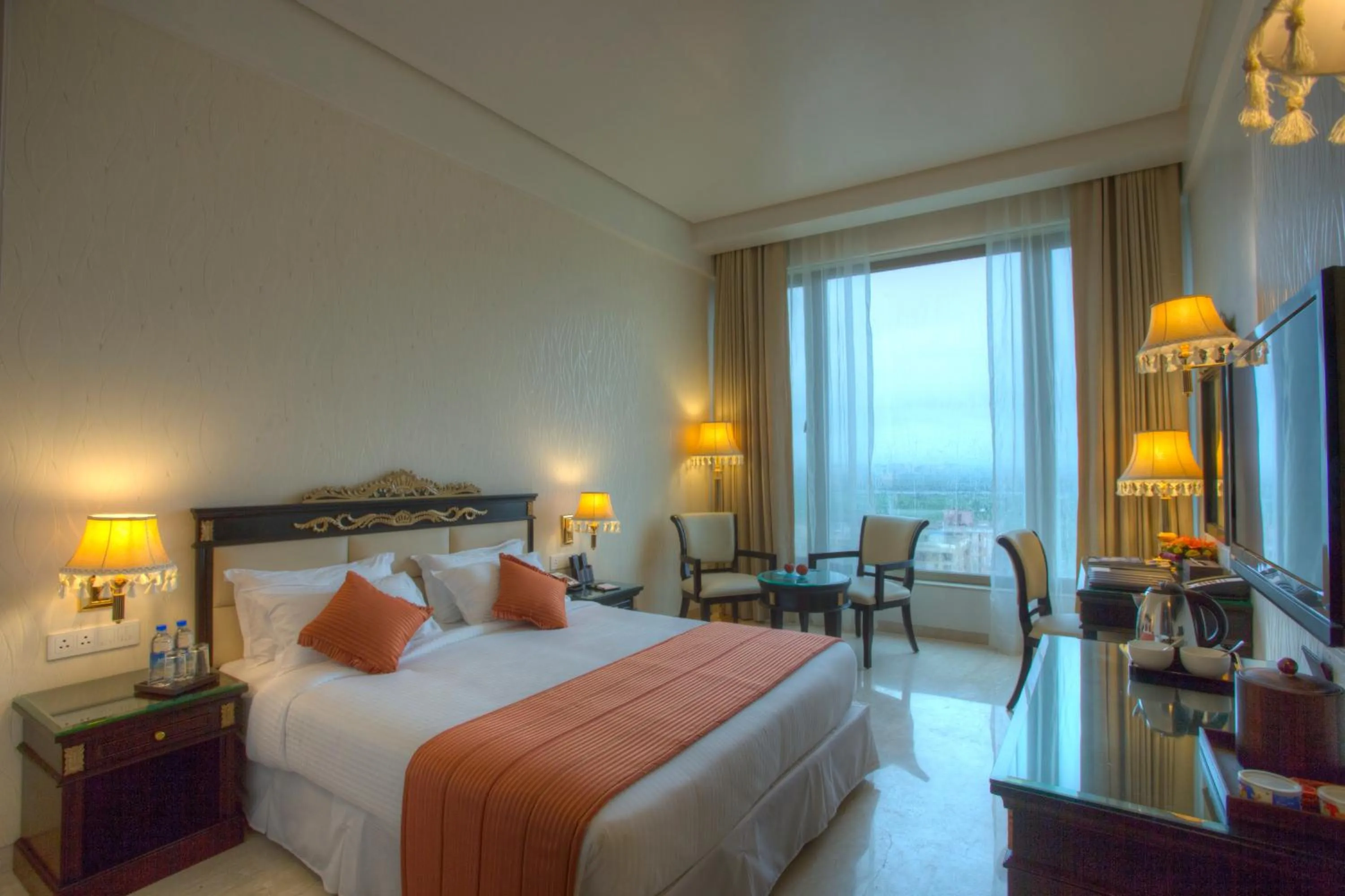 Bed in Royal Tulip Navi Mumbai