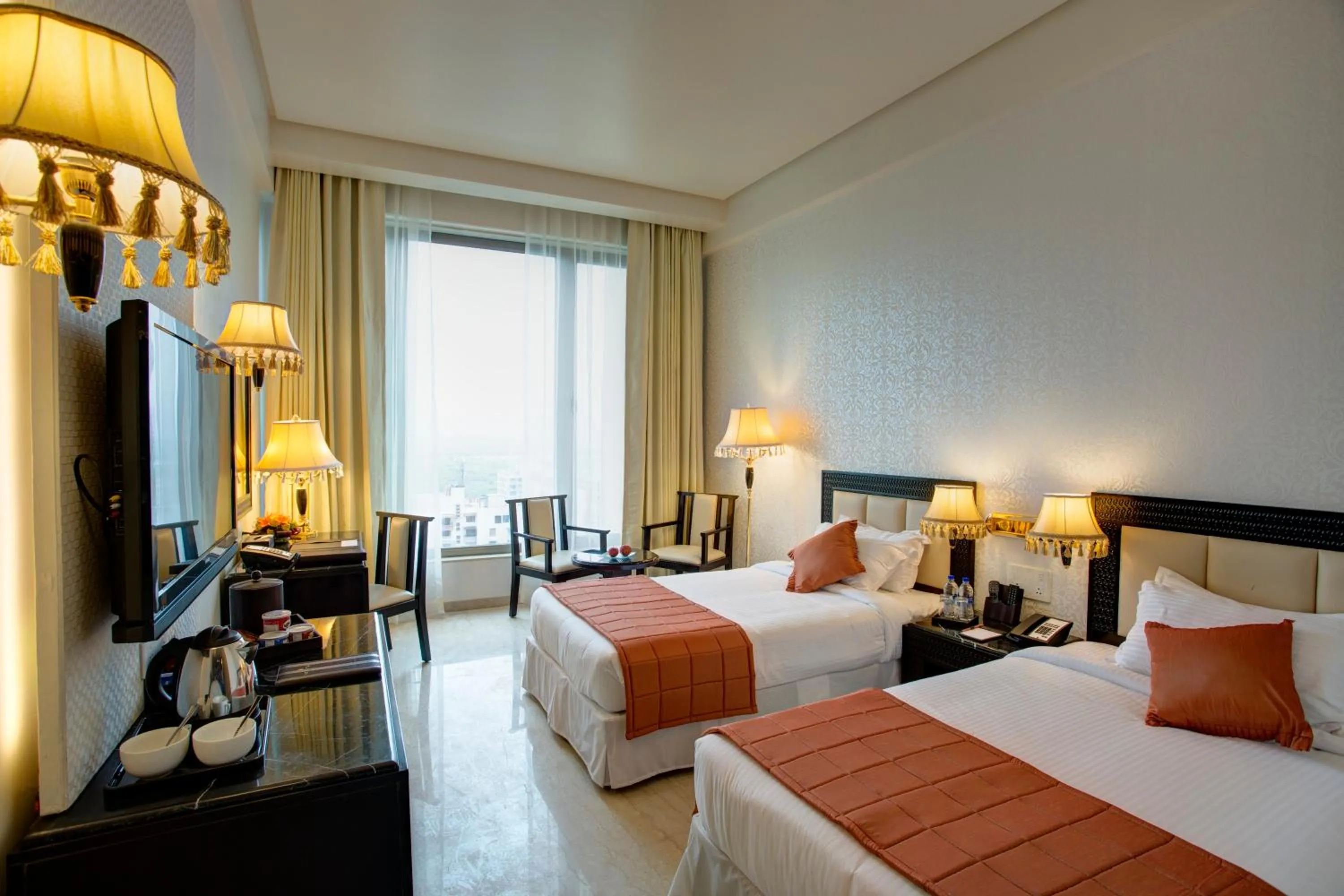 Bed in Royal Tulip Navi Mumbai