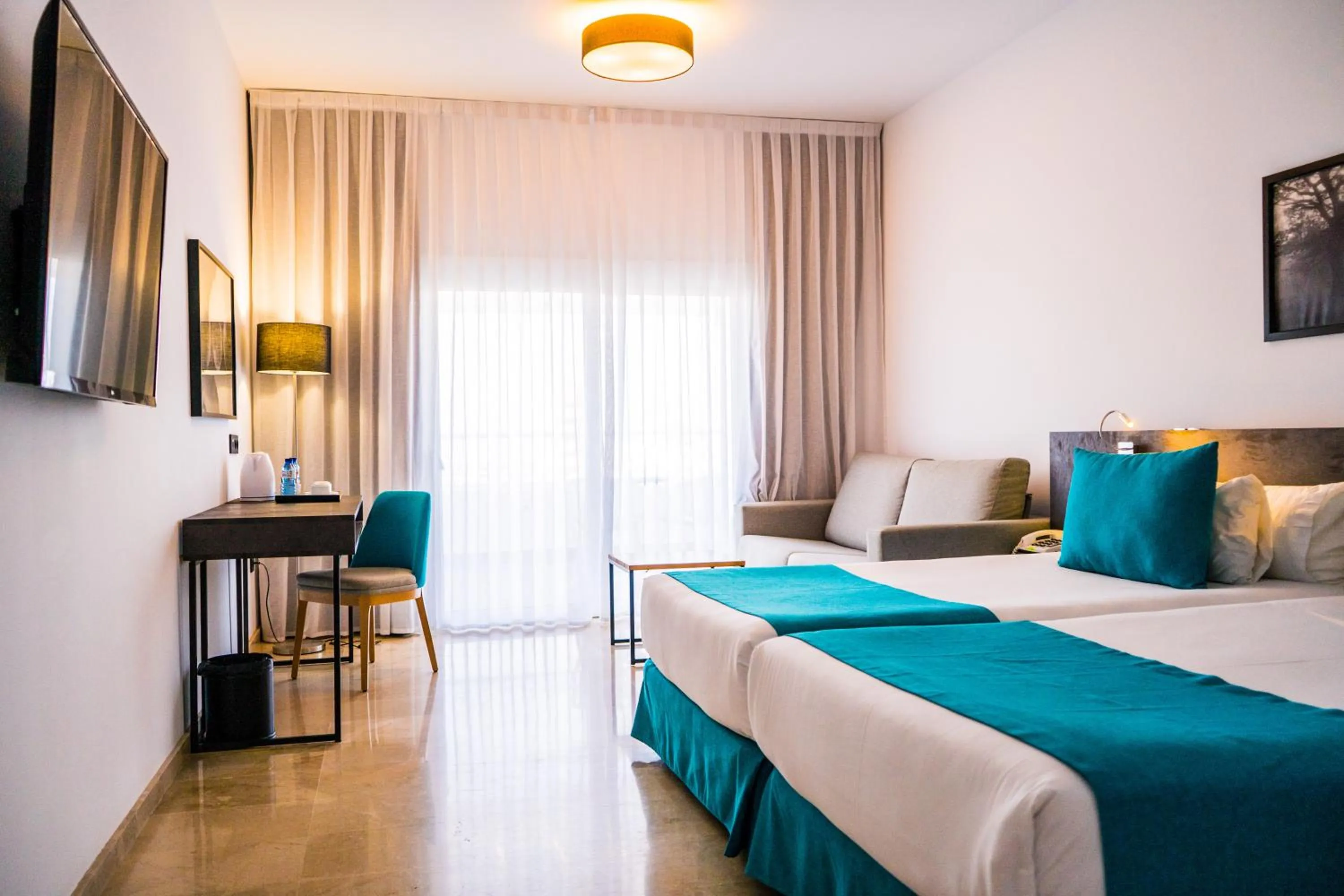 Photo of the whole room, Bed in Moon Hotel & SPA.