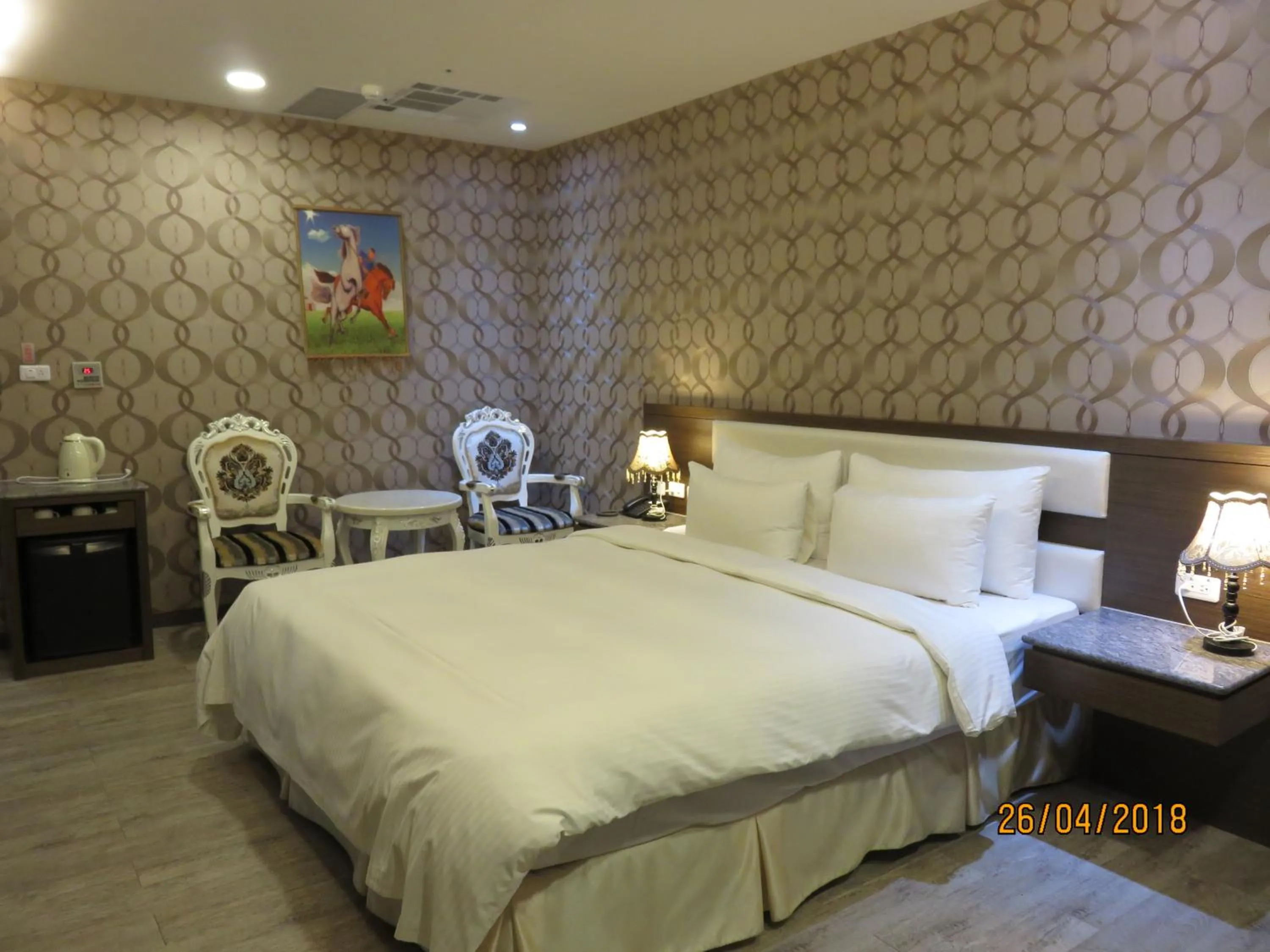 Bed in Mao Hua Motel