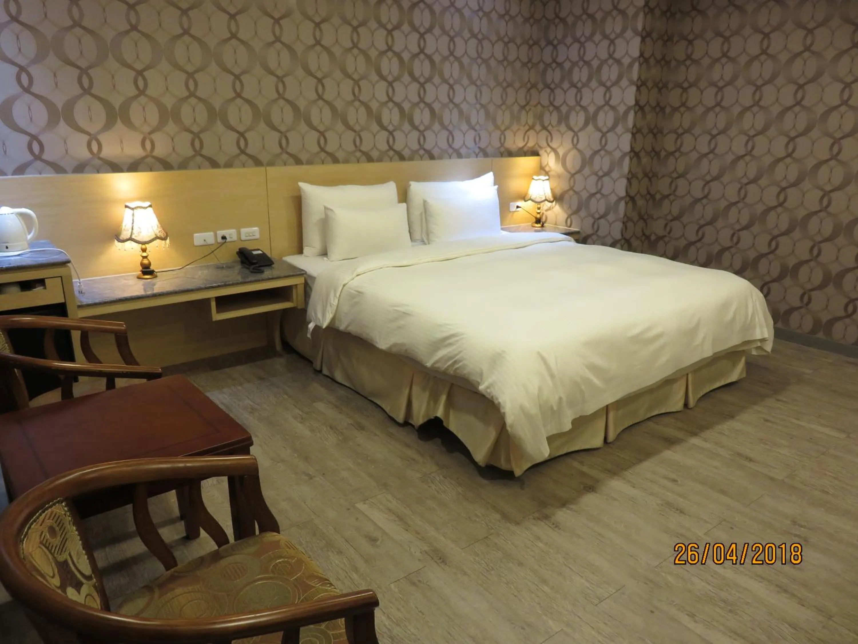 Bed in Mao Hua Motel