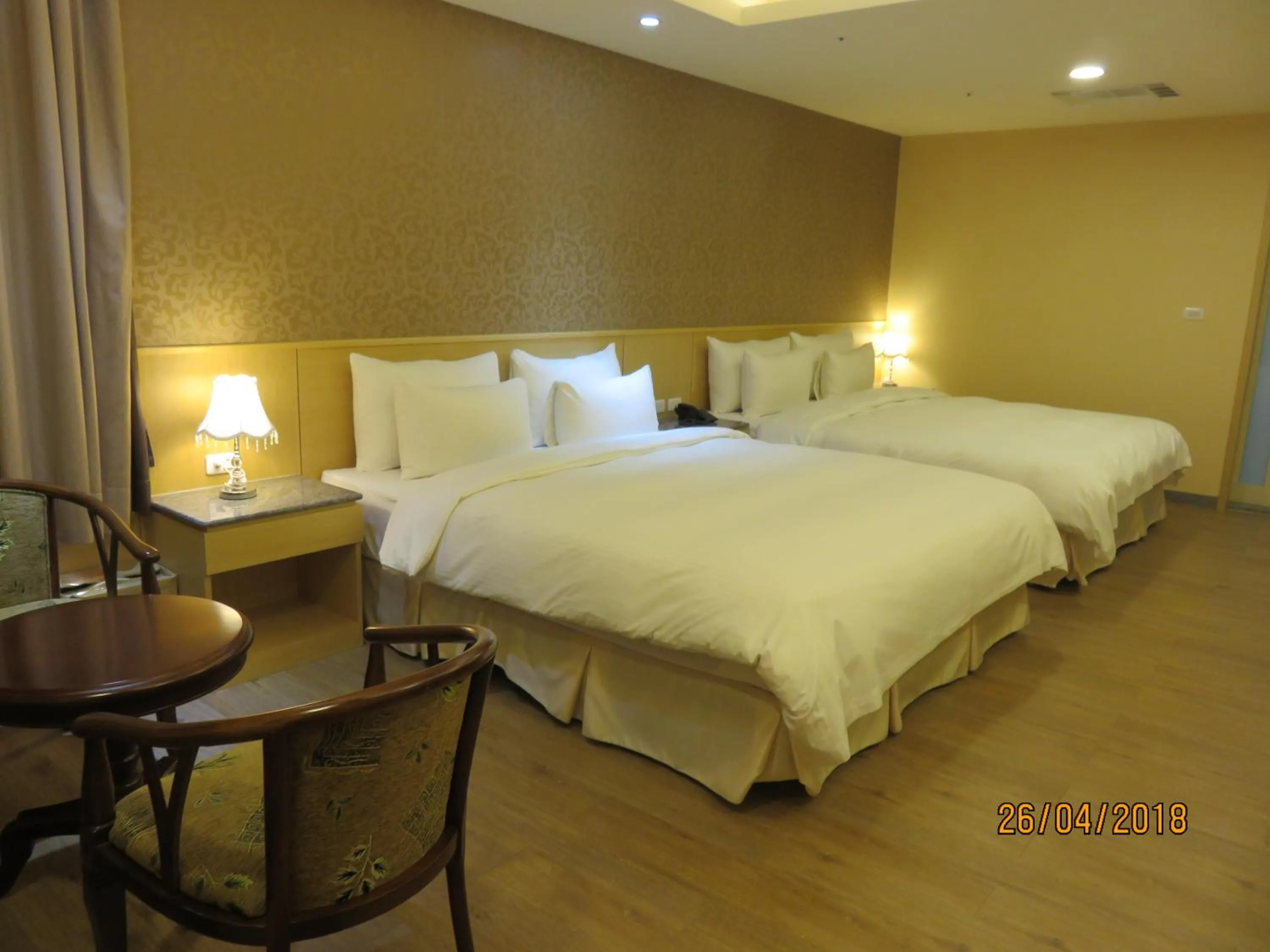 Bed in Mao Hua Motel