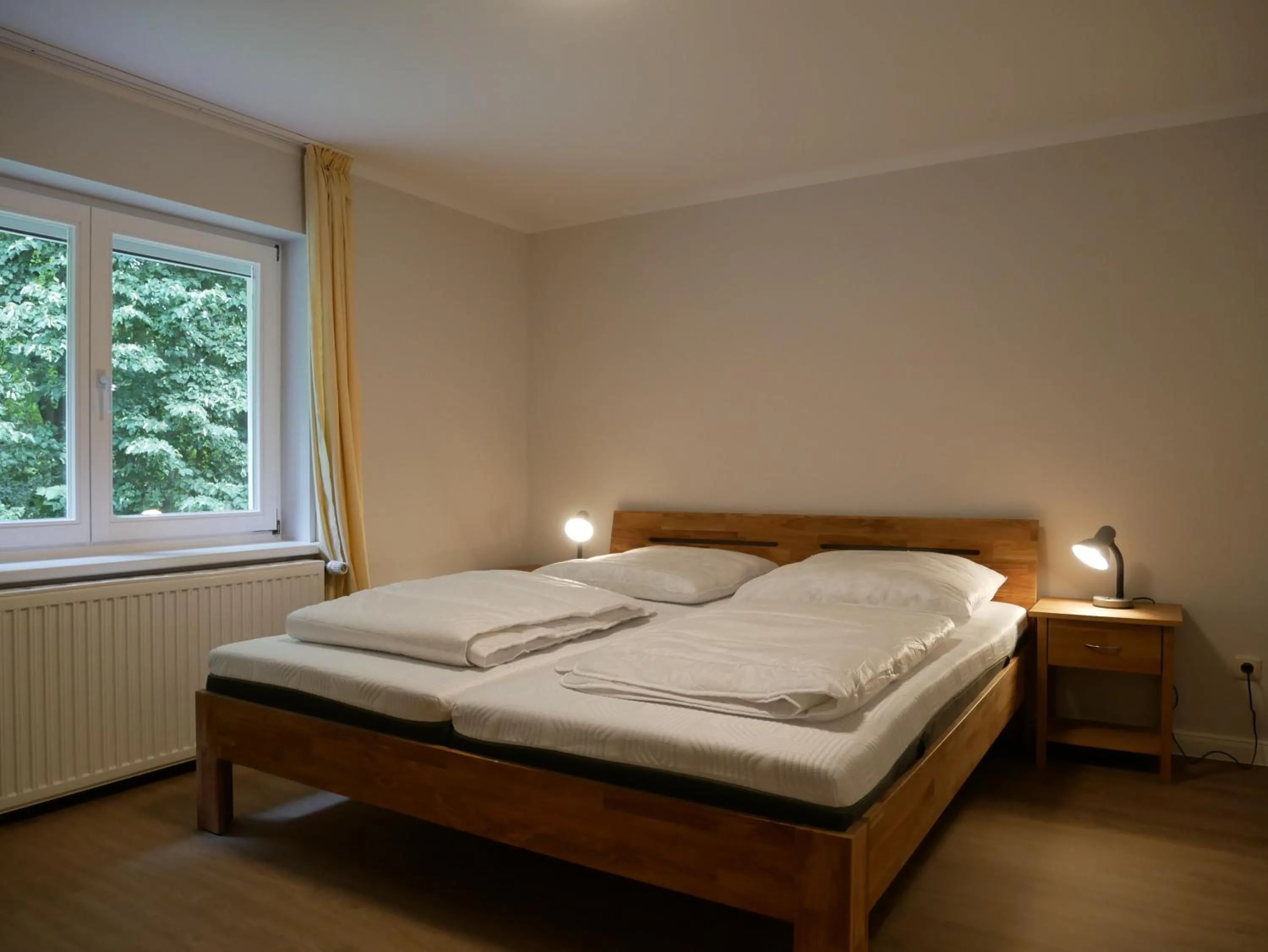 Bed in Ferienwohnungen & Bungalow Karlchen