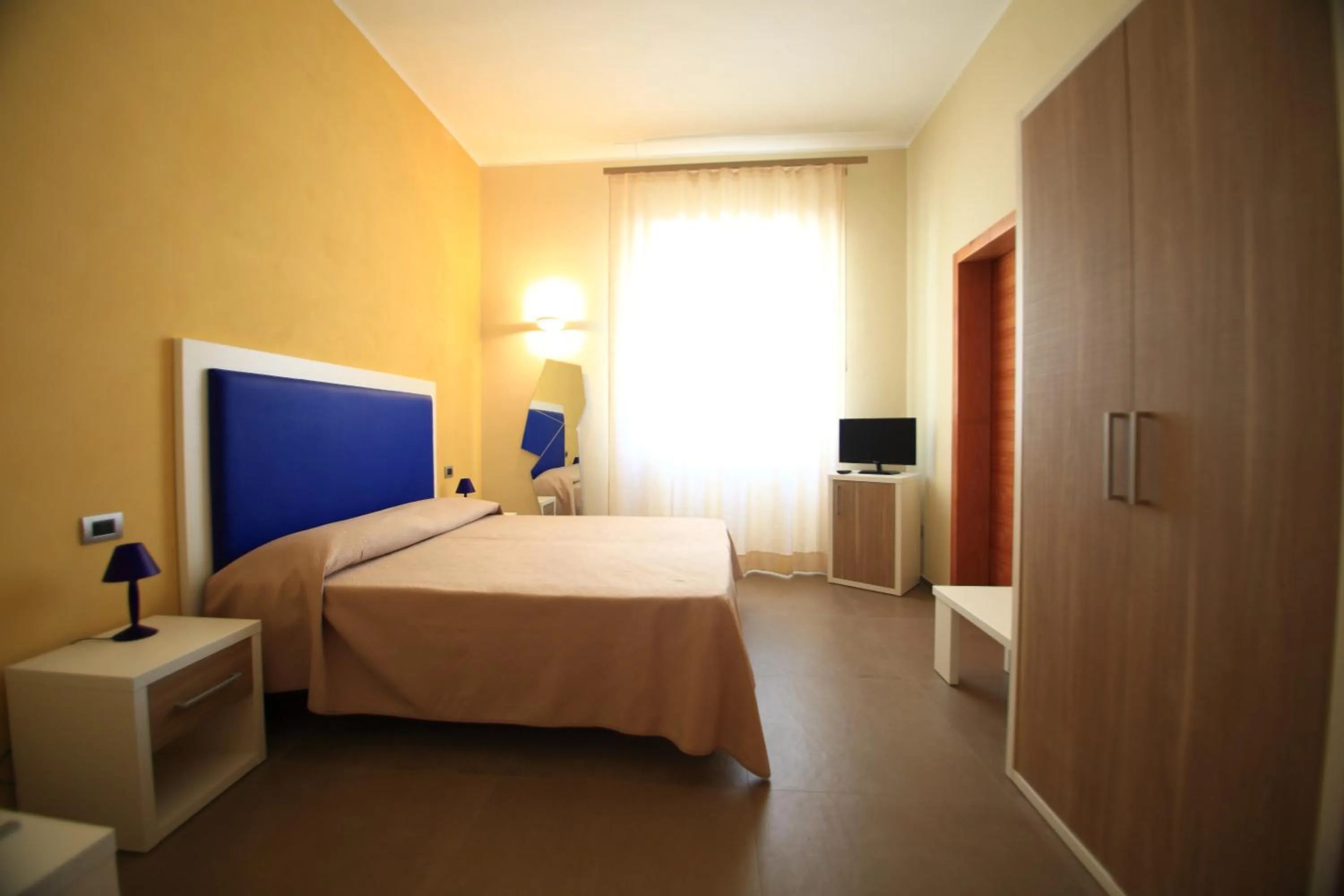 Photo of the whole room in Hotel Città Bella