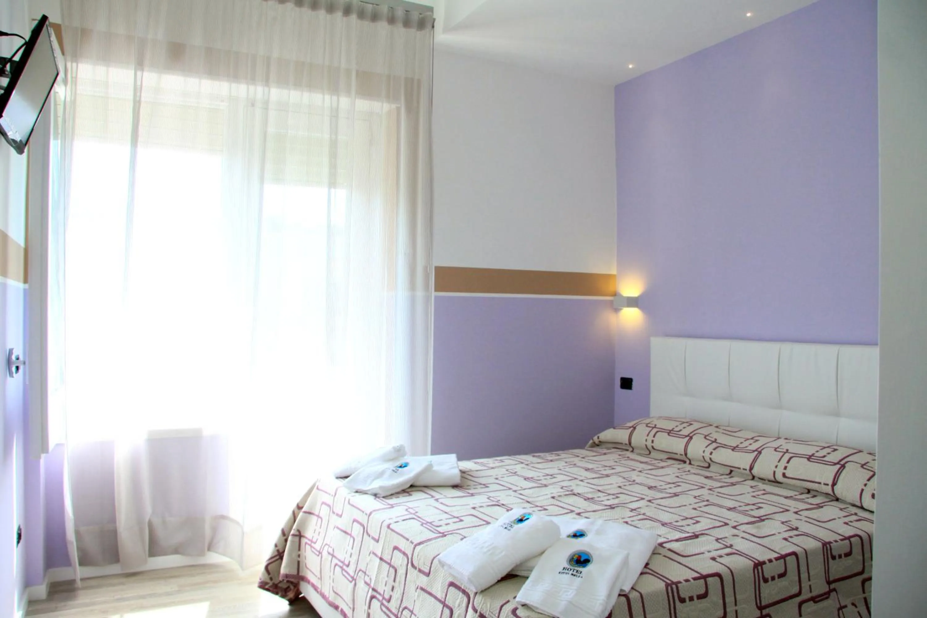 Bedroom in Hotel Città Bella