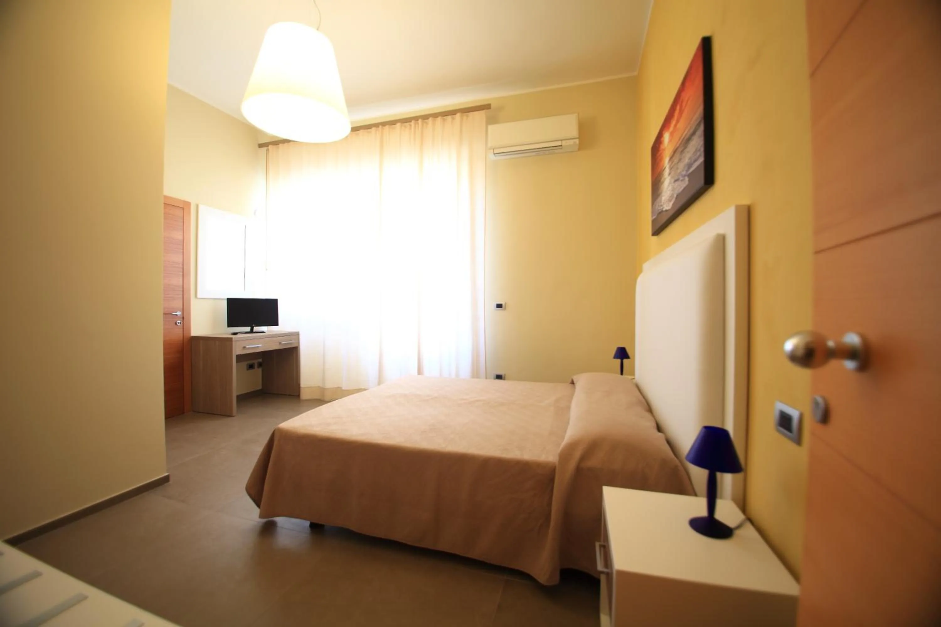 Photo of the whole room in Hotel Città Bella