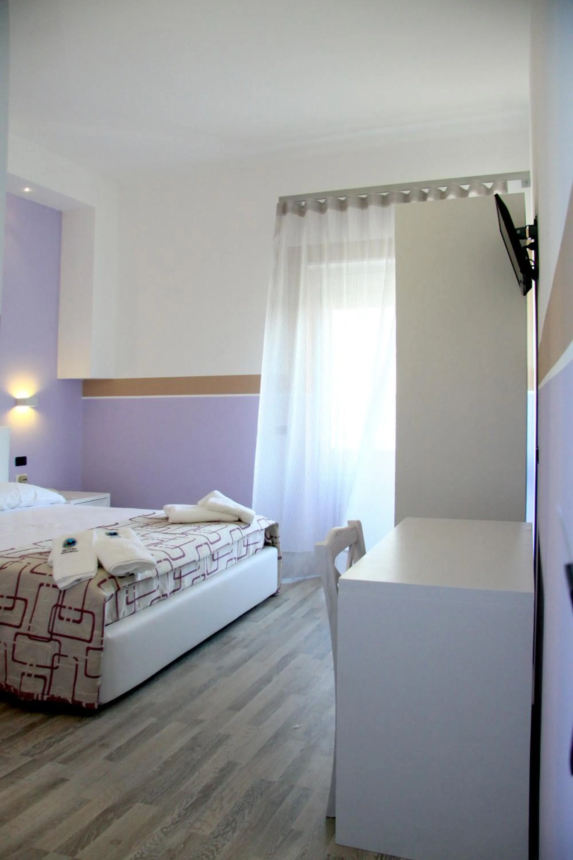 Bedroom in Hotel Città Bella