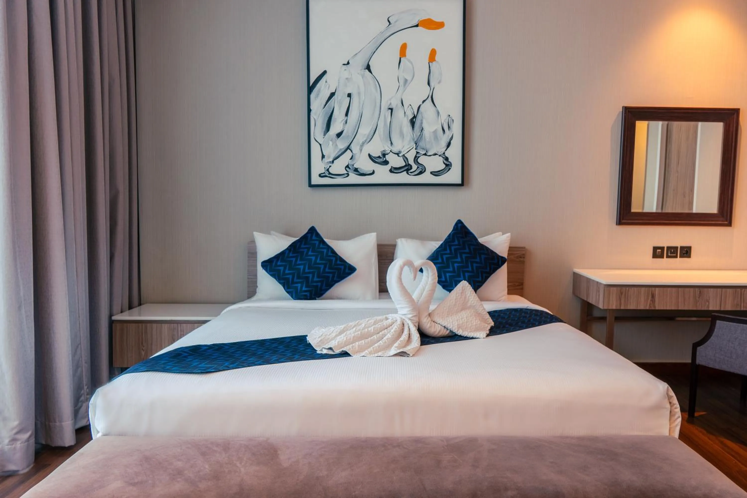 Bed in Azana Suites Hotel Antasari