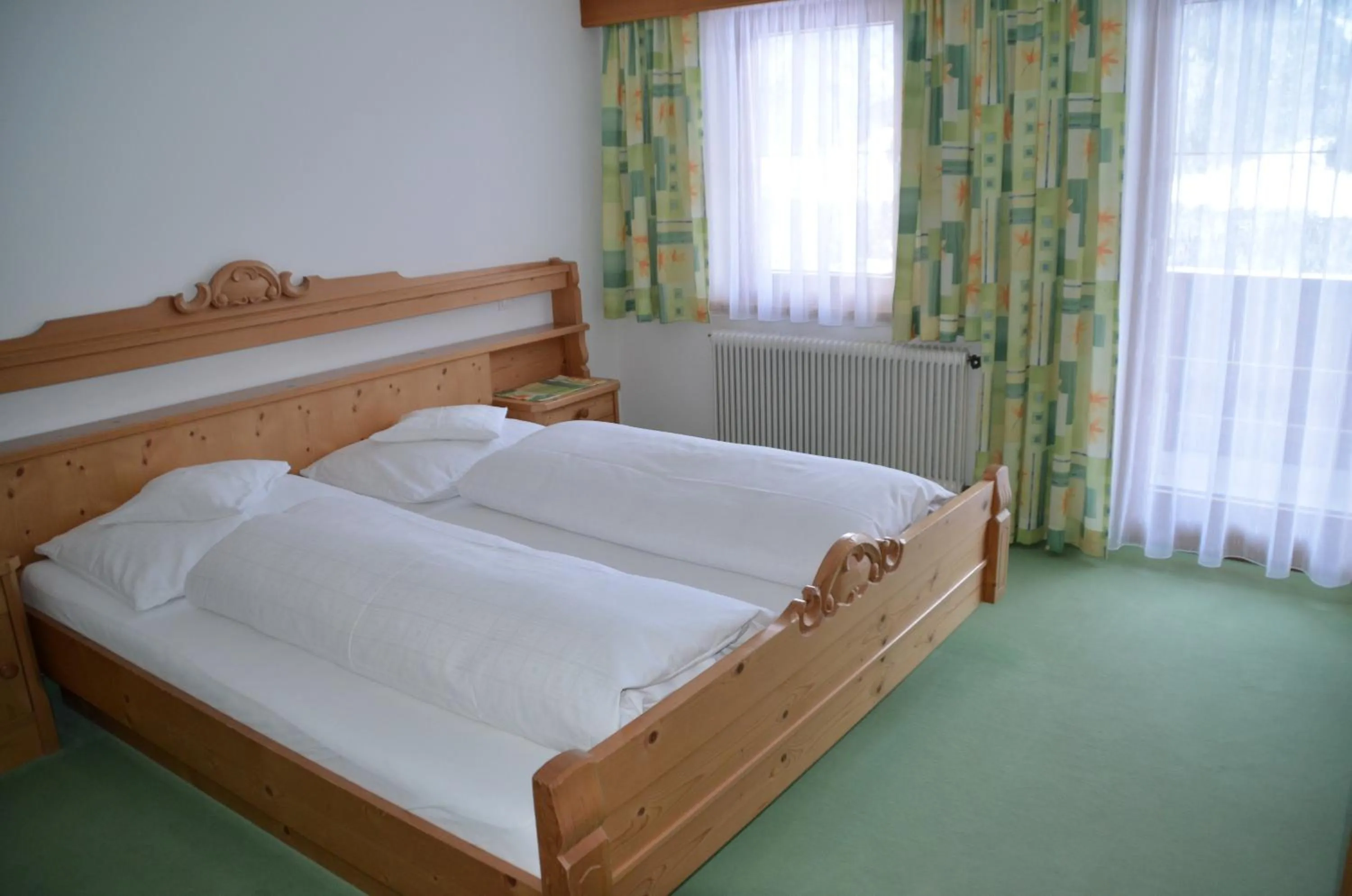 Photo of the whole room, Bed in Pension Kirchbrugger