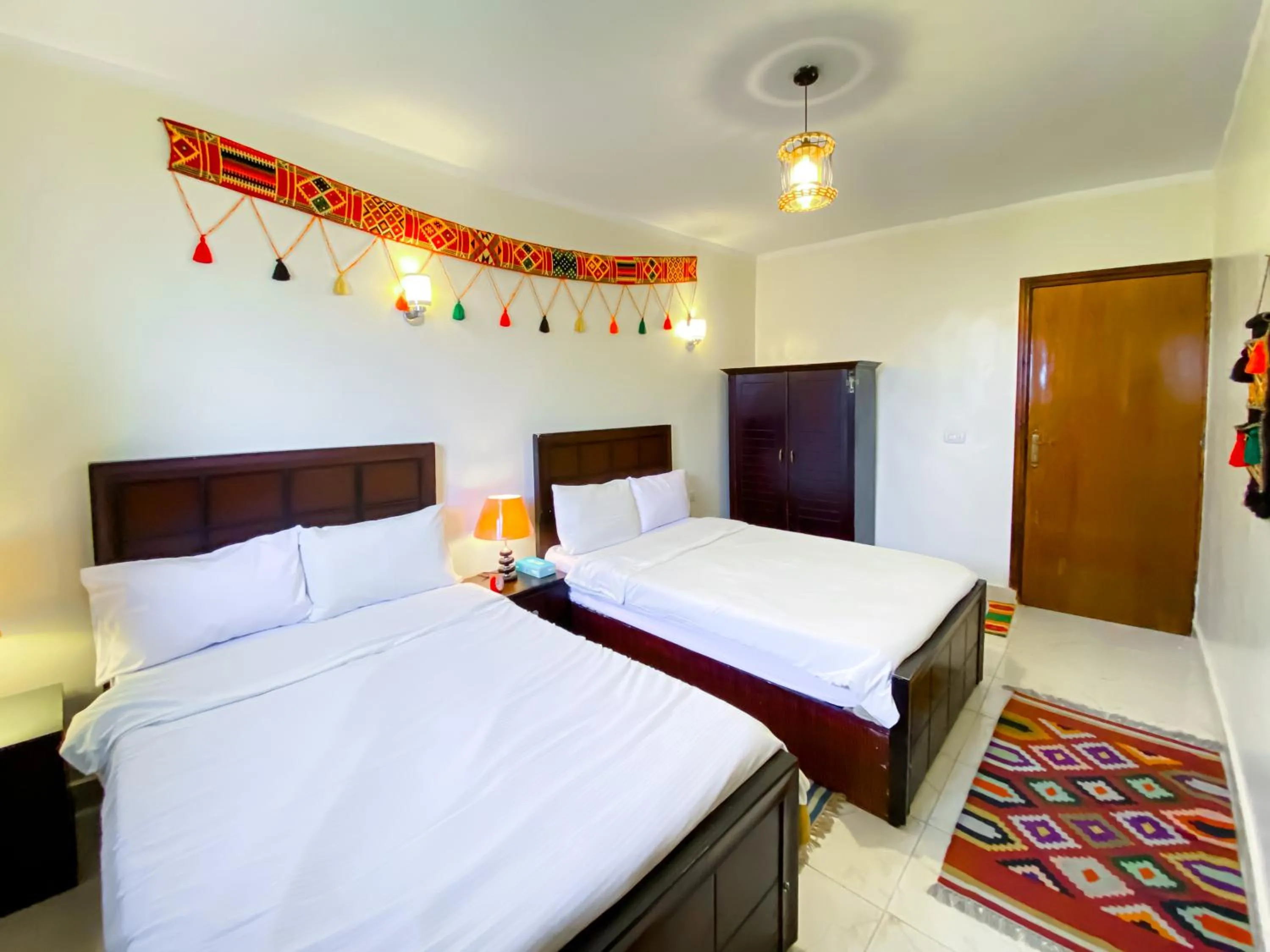 Bed in Atlantis Pyramids Inn