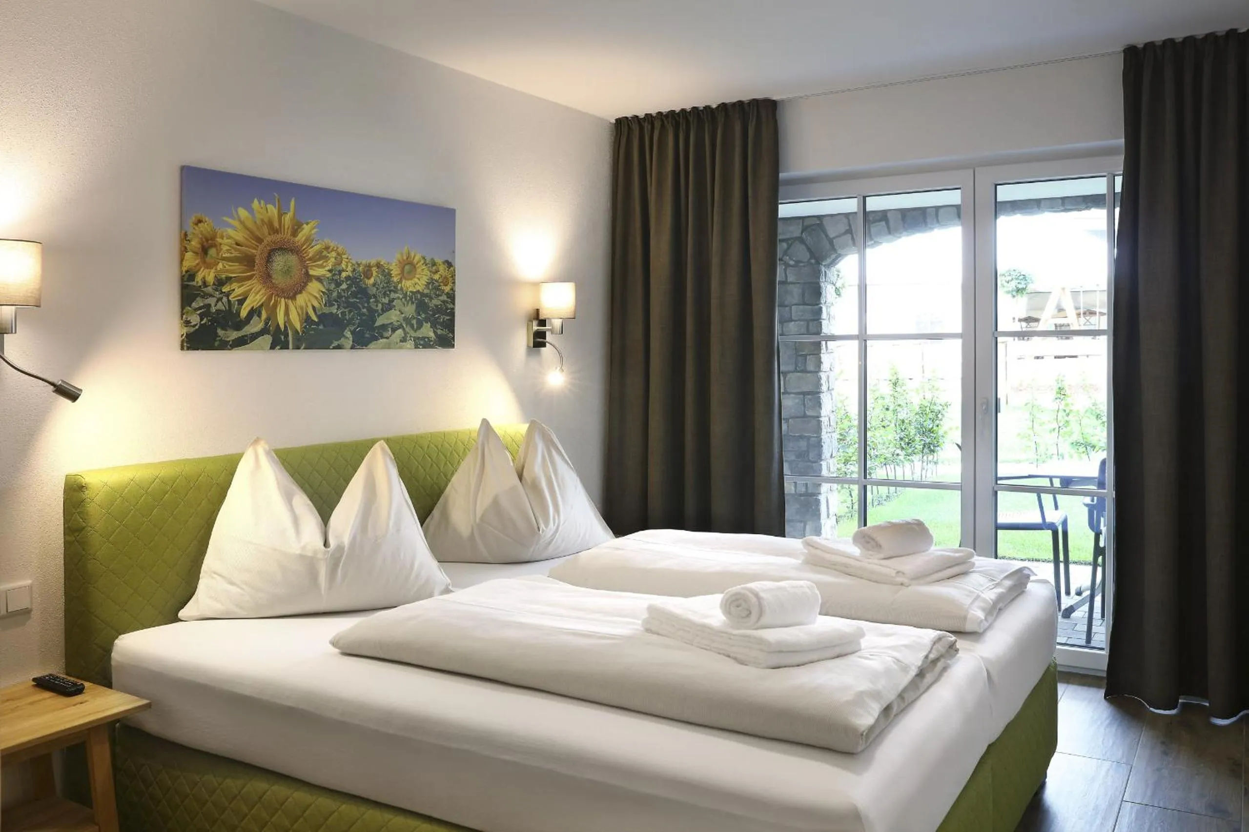 Bed in Tauernsuites Mitterwirt by ALPS RESORTS
