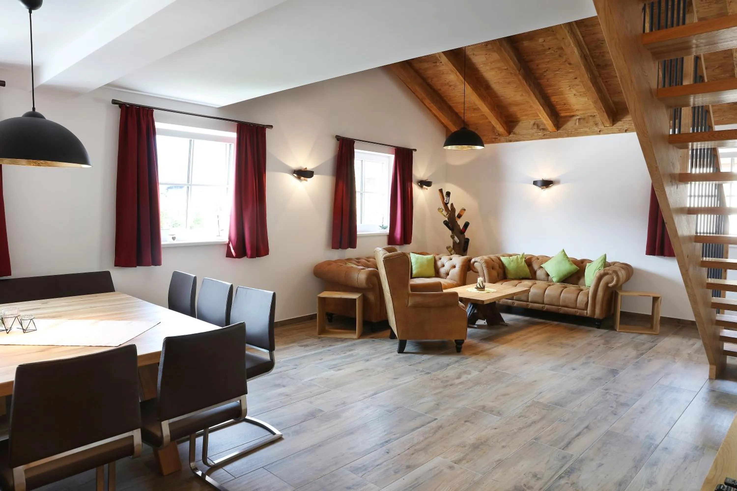 Living room in Tauernsuites Mitterwirt by ALPS RESORTS