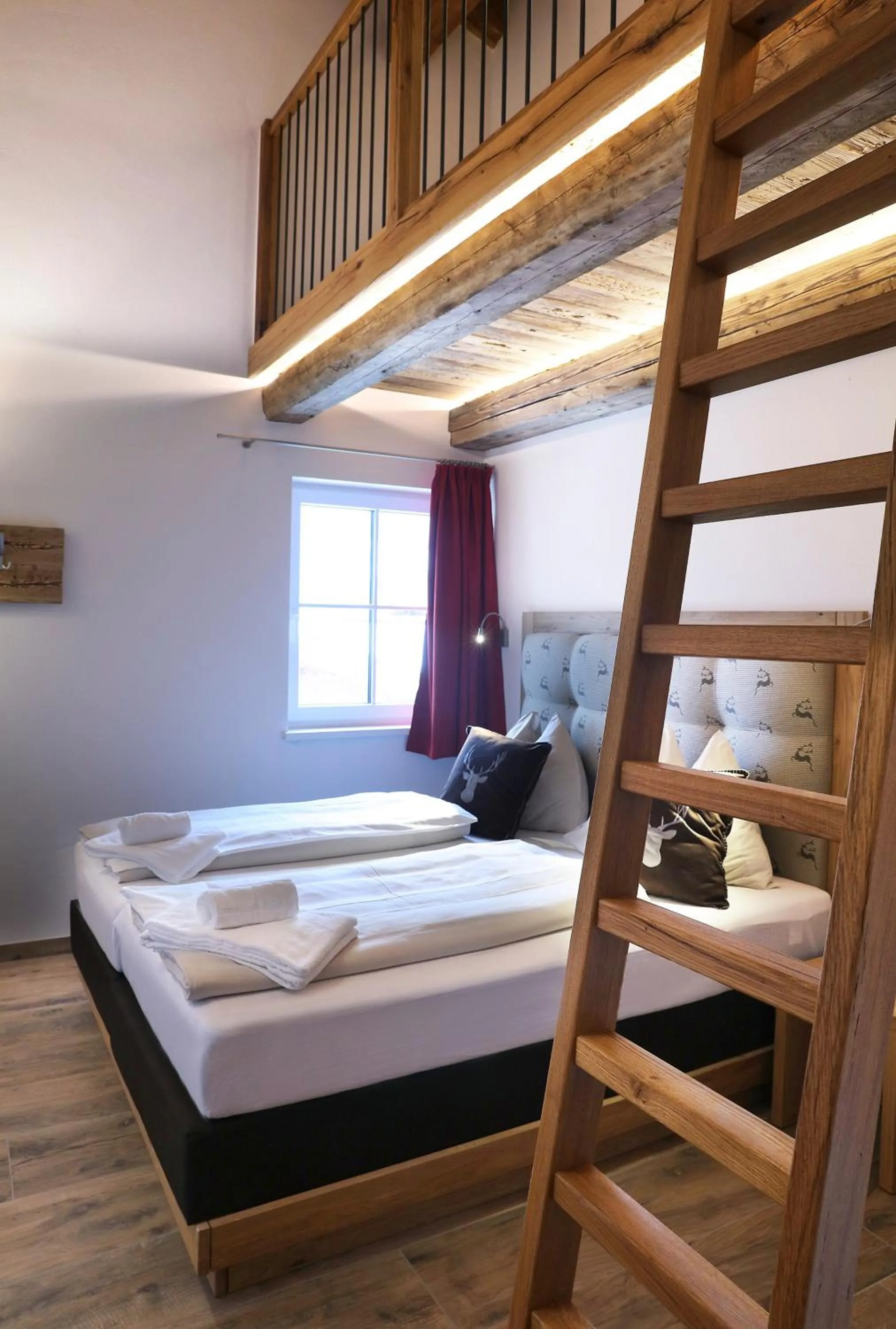 Bed in Tauernsuites Mitterwirt by ALPS RESORTS