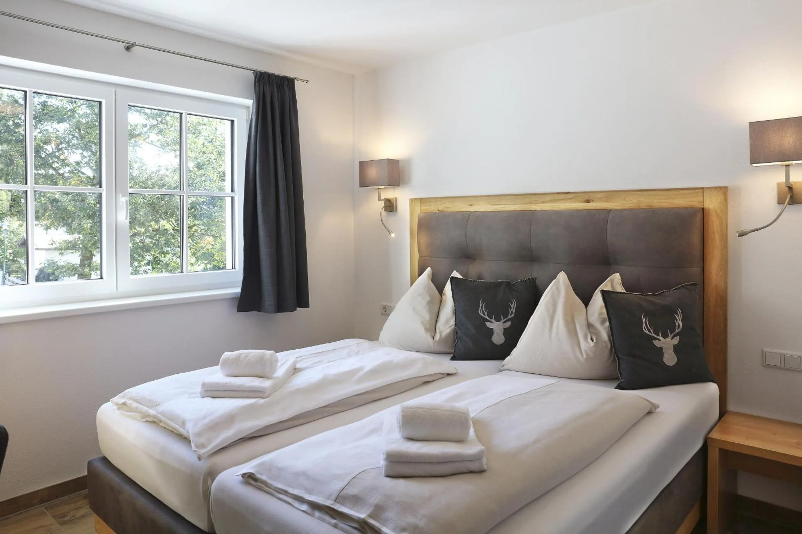 Bed in Tauernsuites Mitterwirt by ALPS RESORTS